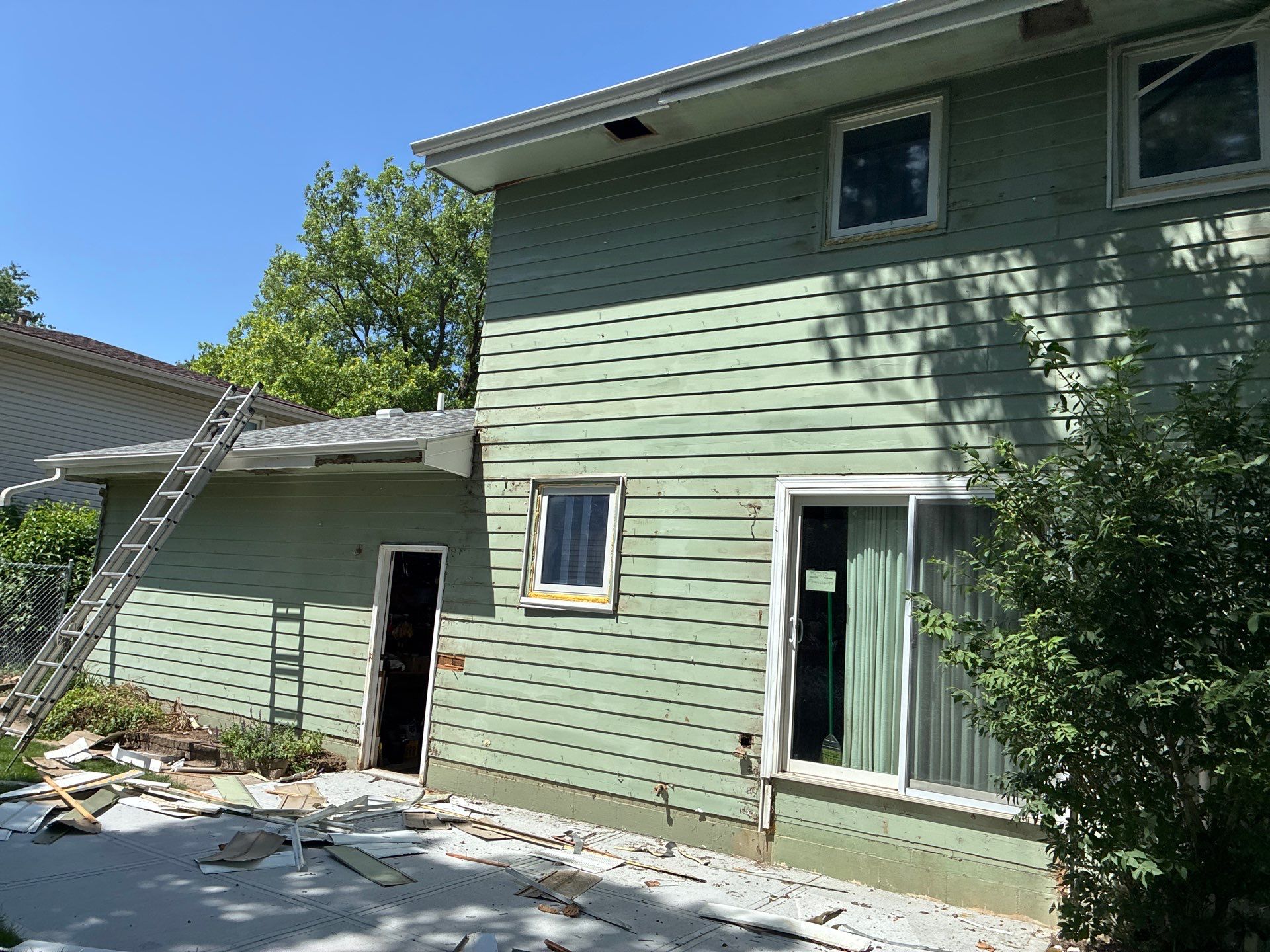 Full James Hardie Siding Replacement and Custom Exterior Paint in Papillion by Carps Complete Exteriors 