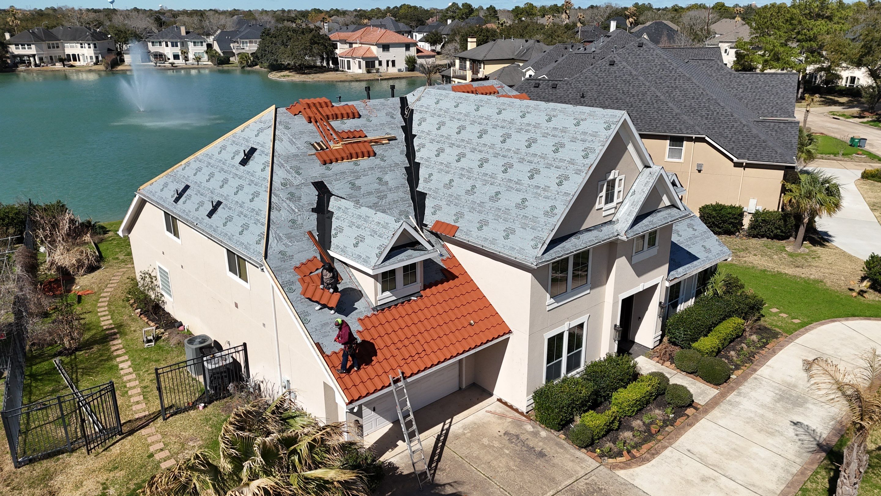 Stunning transformation using DECRA Villa Tile!  by Core Four Roofing