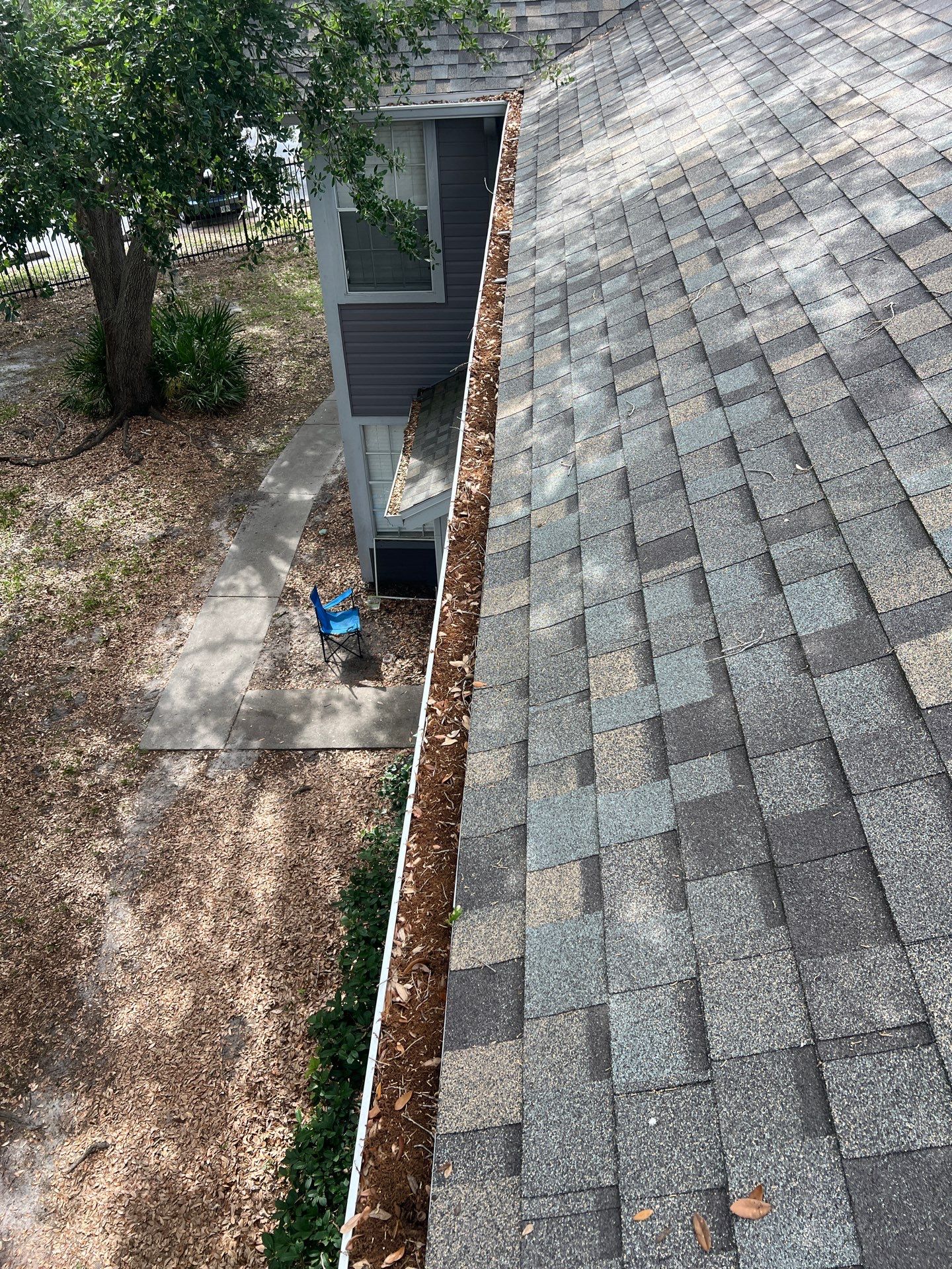 HOA gutter cleaning before photo.