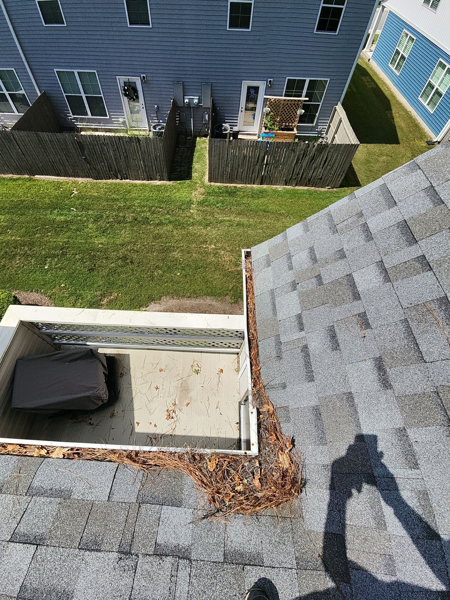 Commercial gutter cleaning Virginia Beach & Norfolk before photo with filled gutters