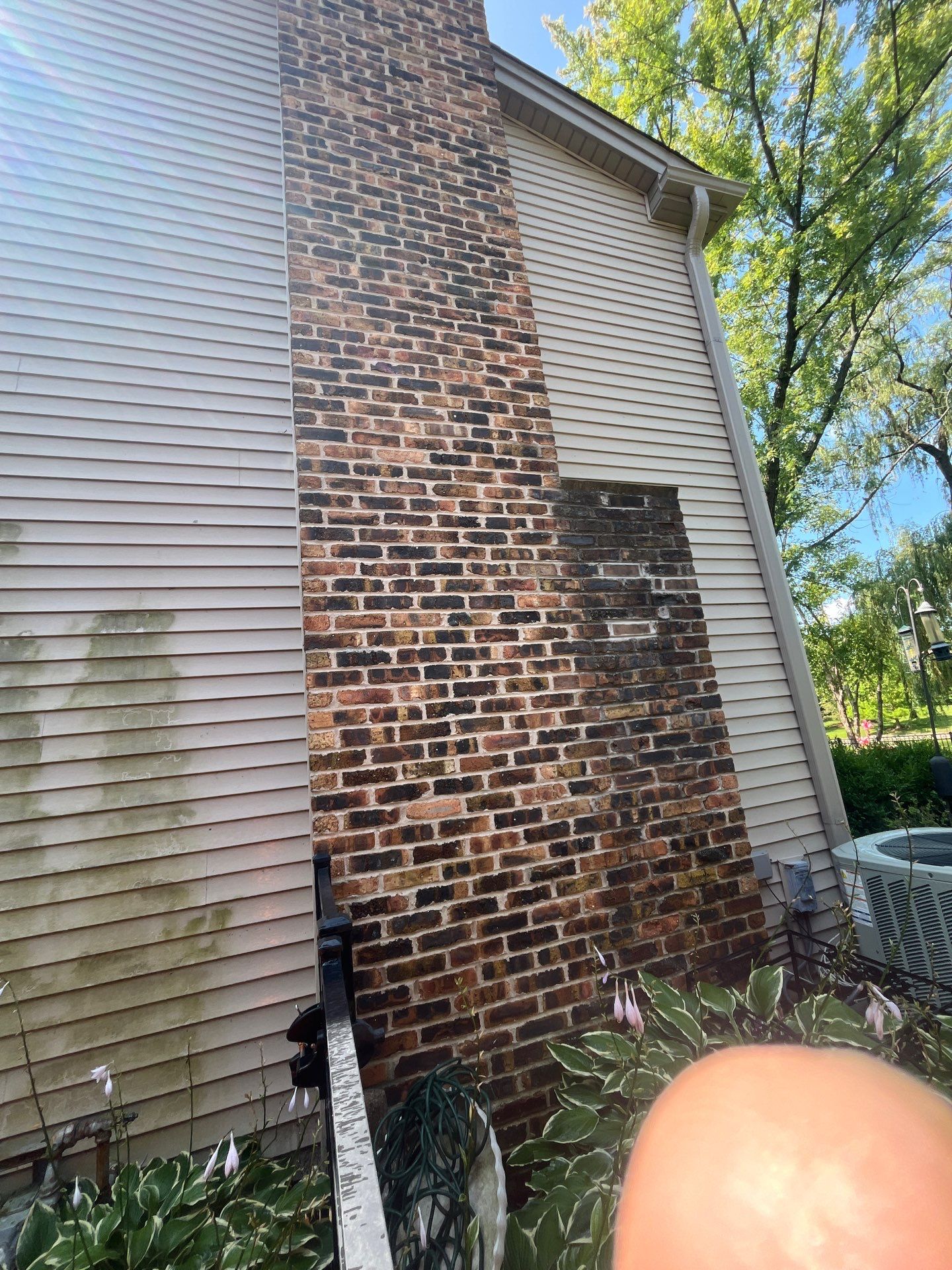 Housewashing  using Algaecide, soft wash soap by Northern Power Washing LLC.