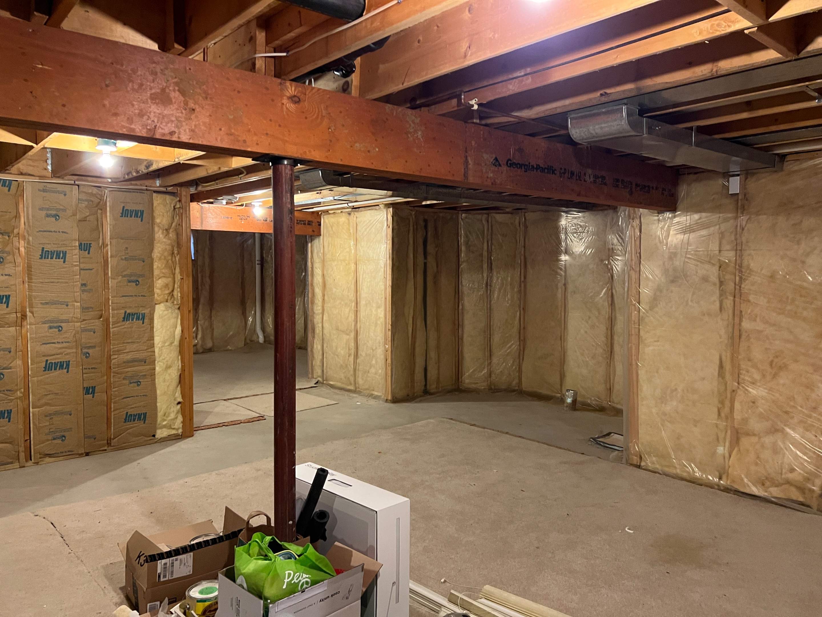 Basement Remodel w/ LVP Flooring & Exposed Ceiling by Chagnon Building & Remodeling LLC