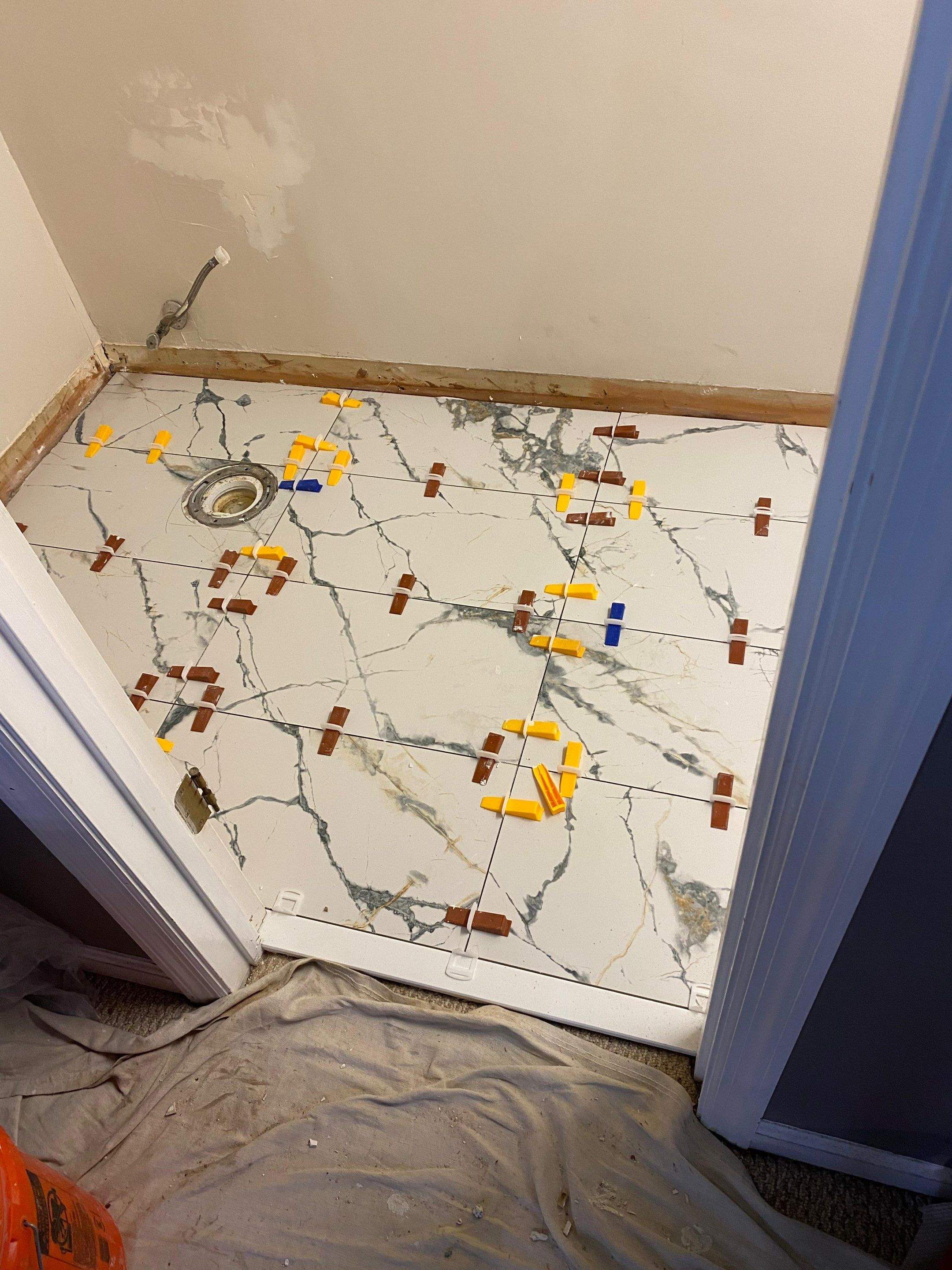 Half bathroom renovation by Prudencio