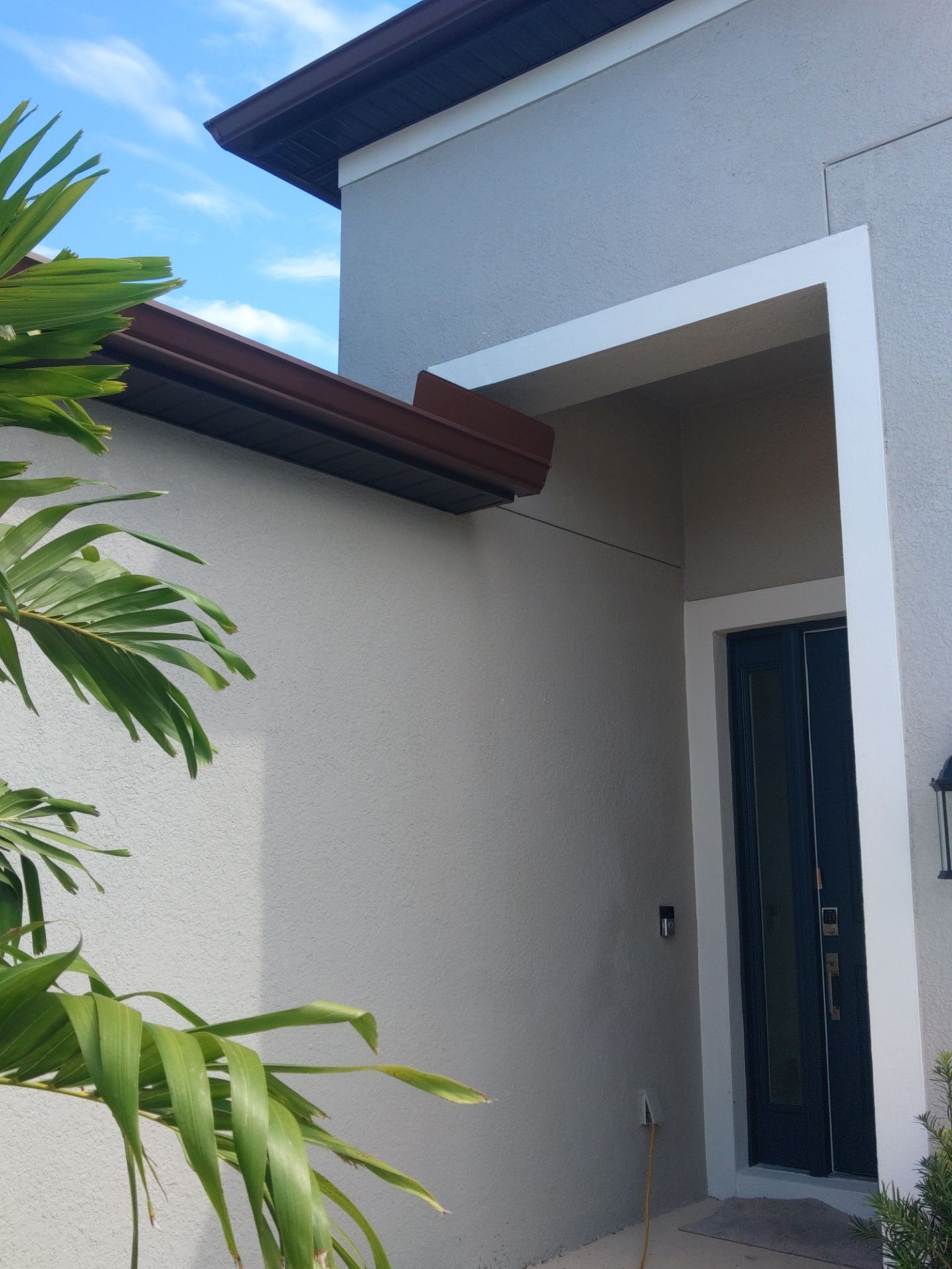 Musket Brown Seamless Gutters using Musket Brown Seamless Gutters in Nokomis FL by Gutter Professors
