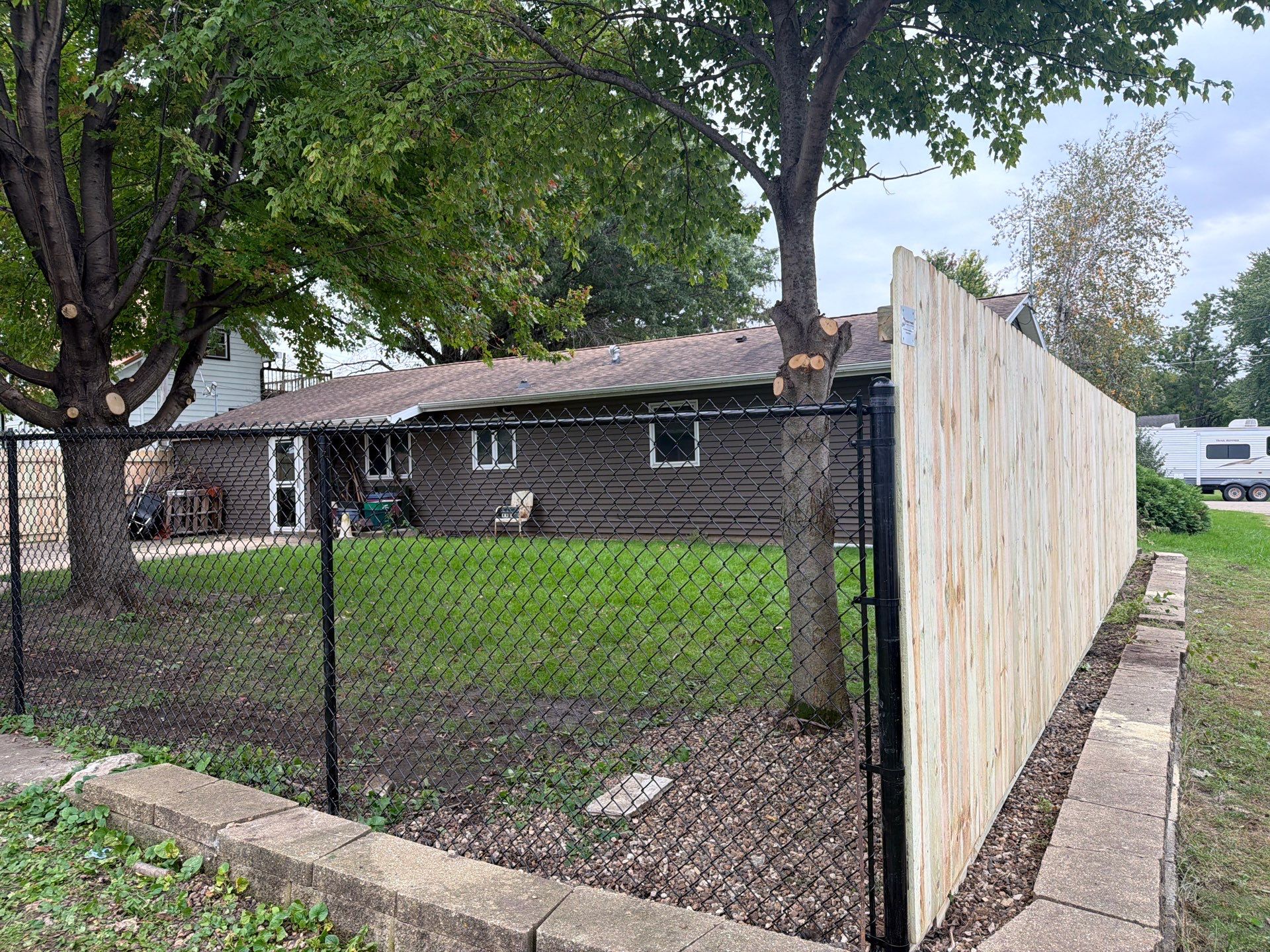 Custom Wood Privacy and Black Chain Link Fence in Hudson by Perfect Picket Fence and Stain