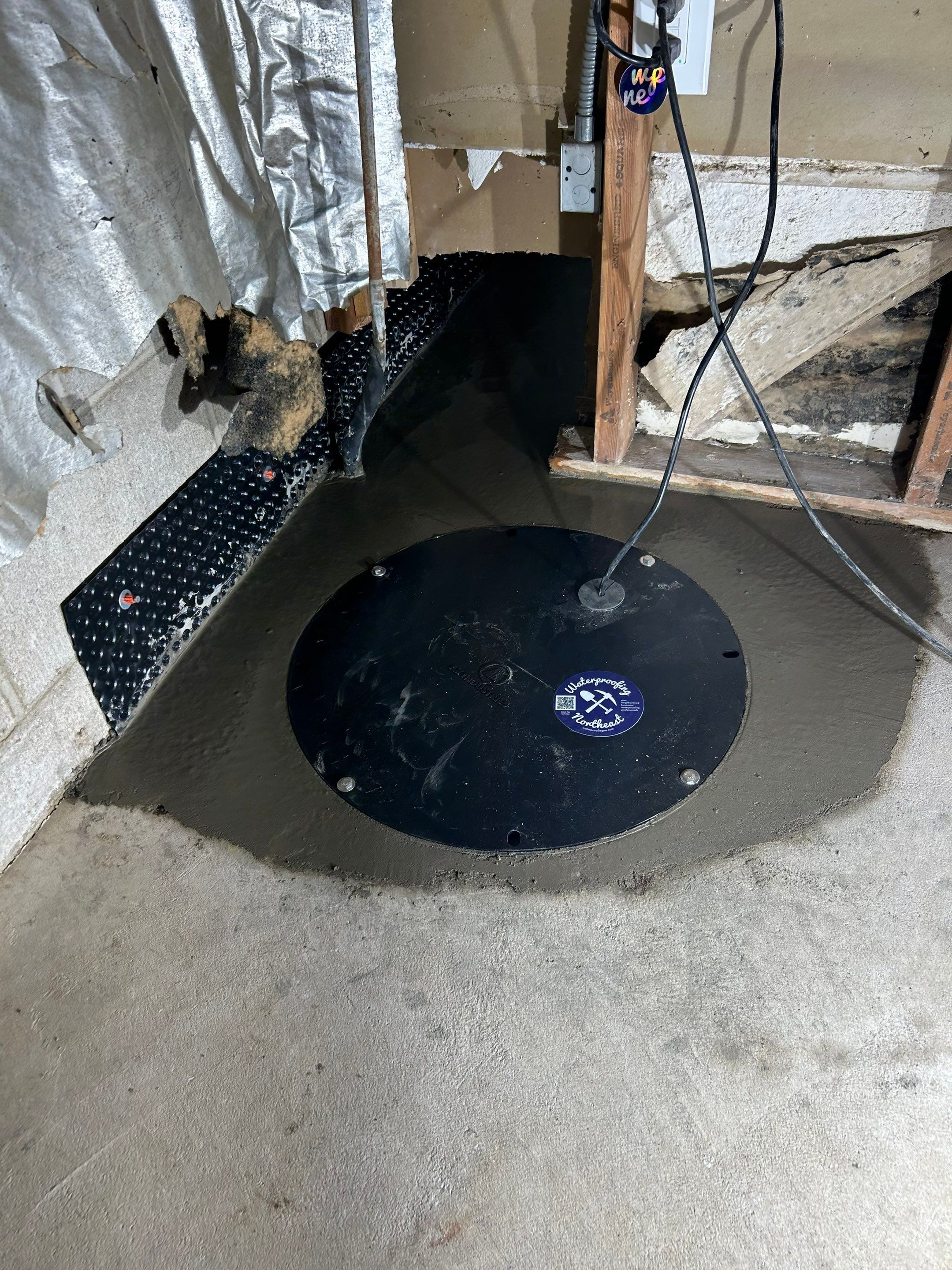 Drain tile and sump pump for George by Waterproofing Northeast