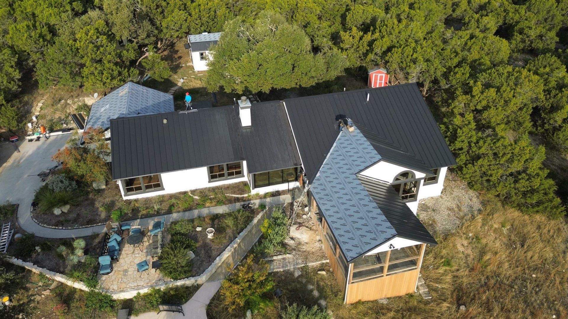 Residential Roofing Installation using Standing Seam Metal (Color, 500 Kynar Finish) in Matte Black by Texas Choice Roofing