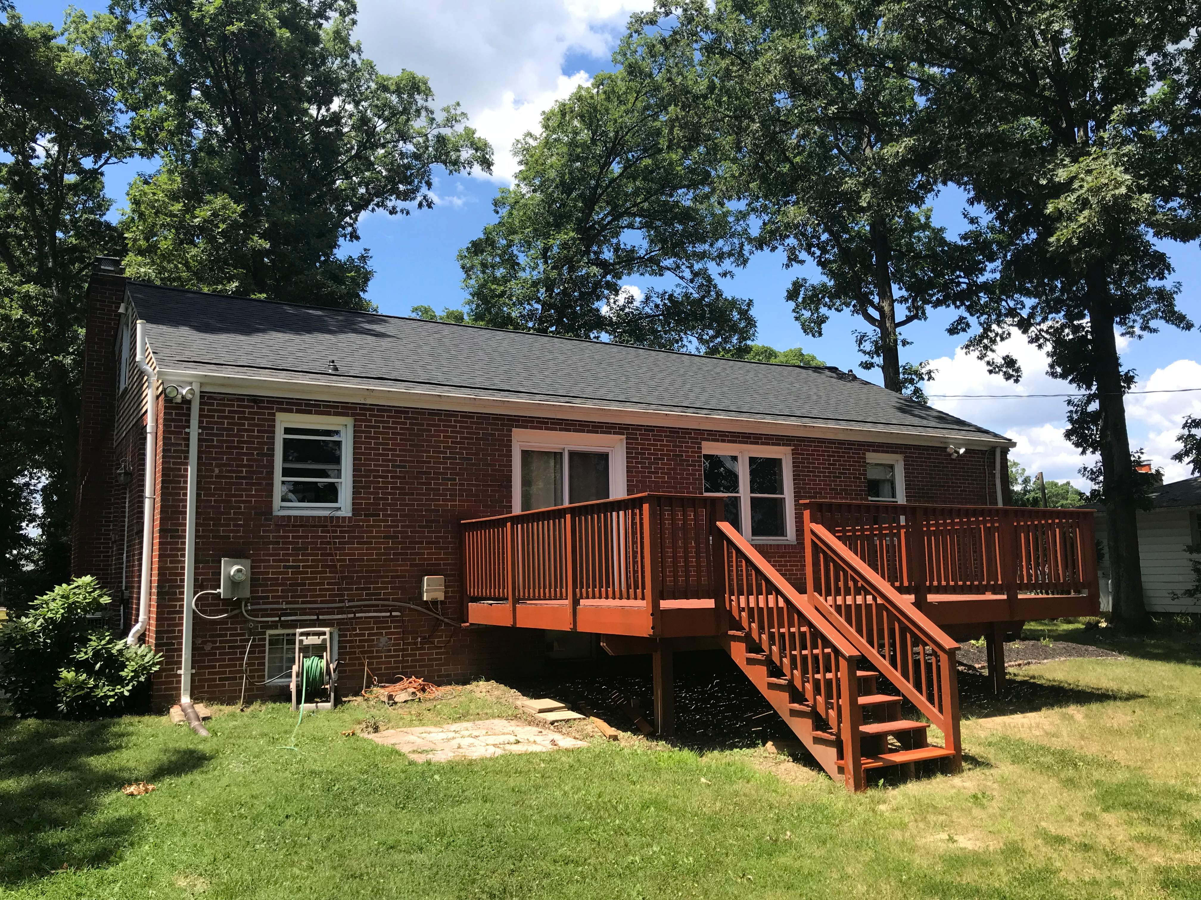 Residential Roofing Installation using Charcoal Black by Alpha Design Services