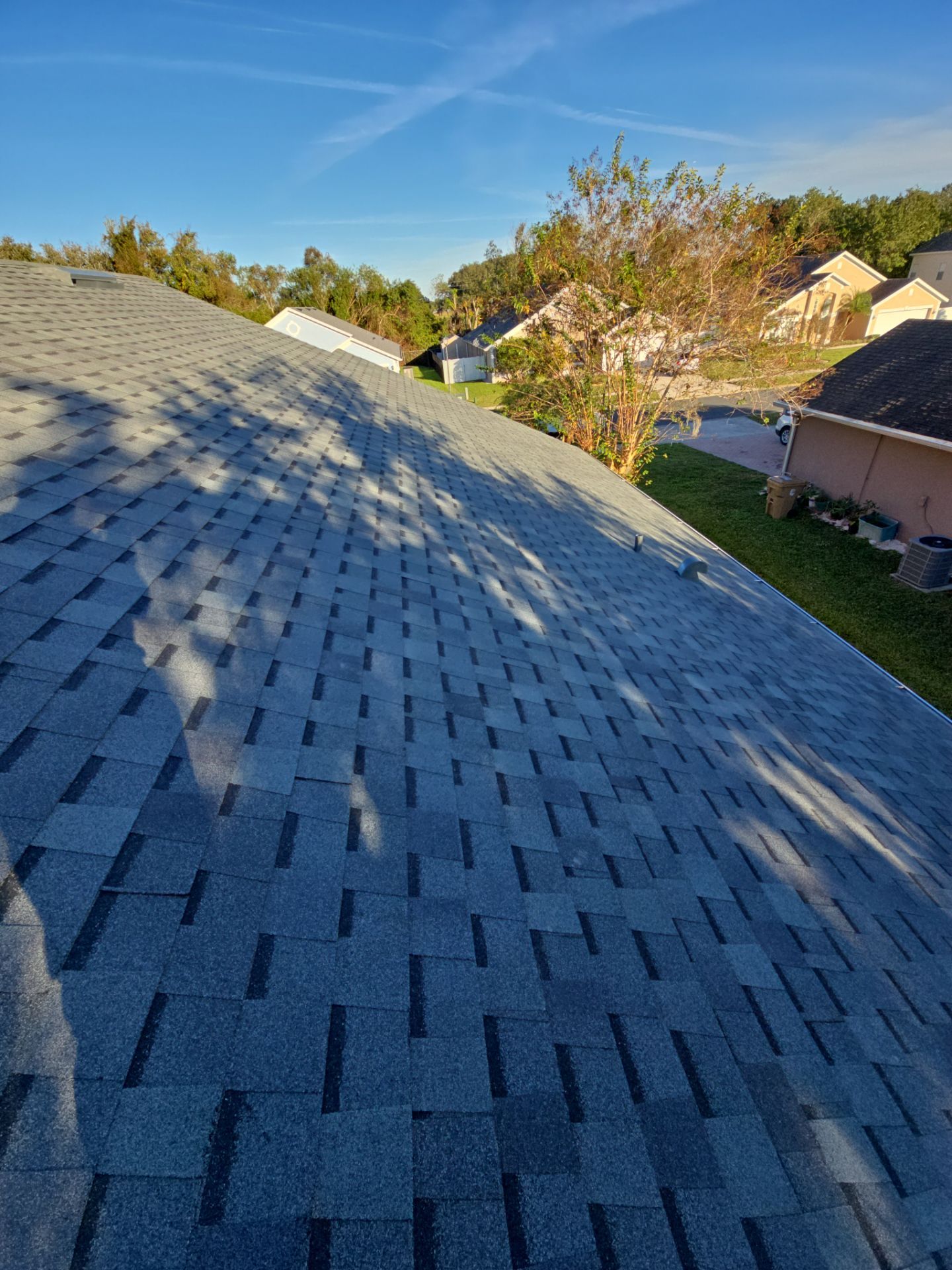 Atlas Pinnacle Pristine Architectural Shingle Roof Replacement in Kissimmee by Fortified Roofing Solutions Corp.
