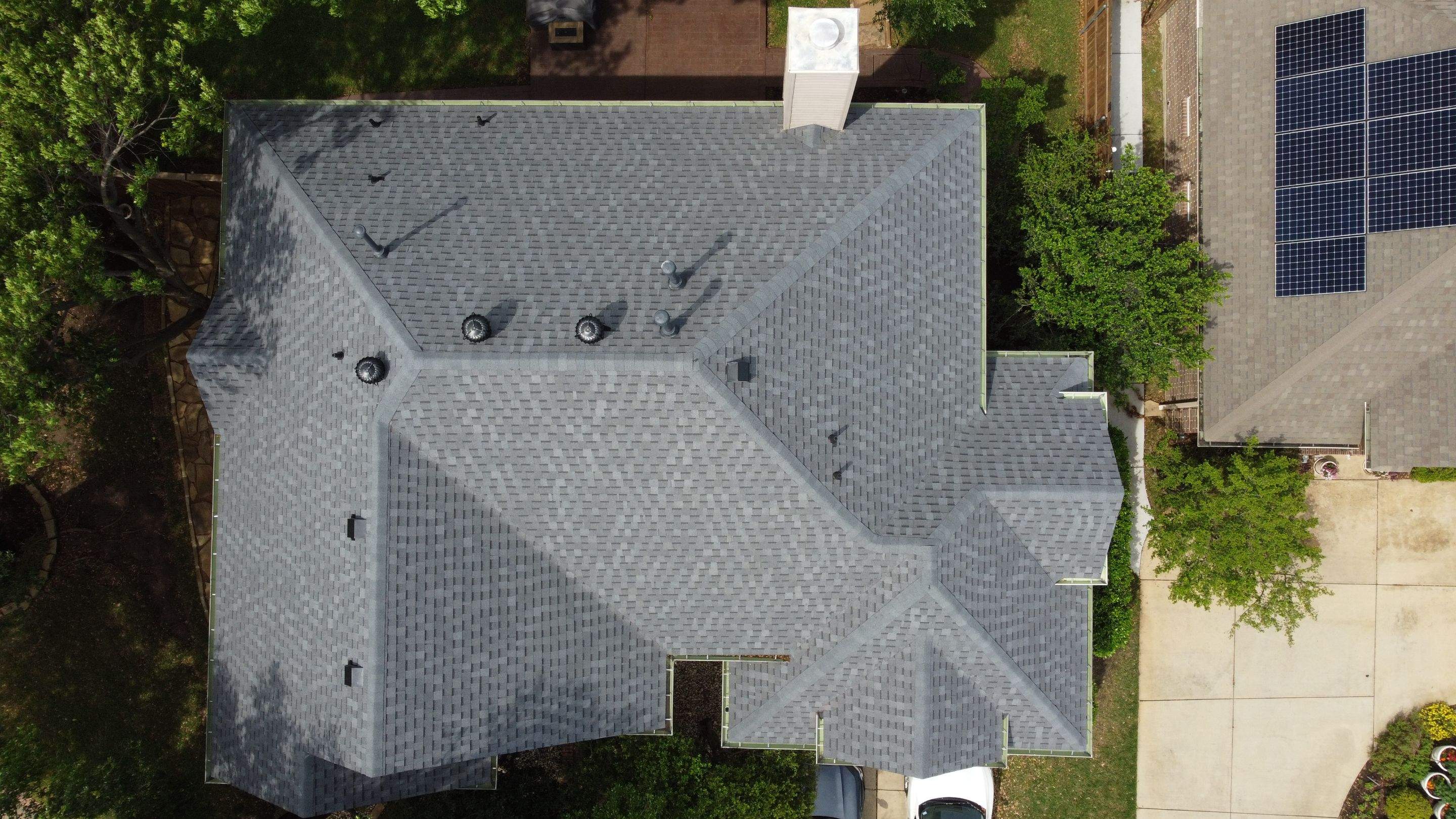 Residential Roofing Installation using ATLAS Pinnacle Pristine Shingles by Harvey Roofing & Construction