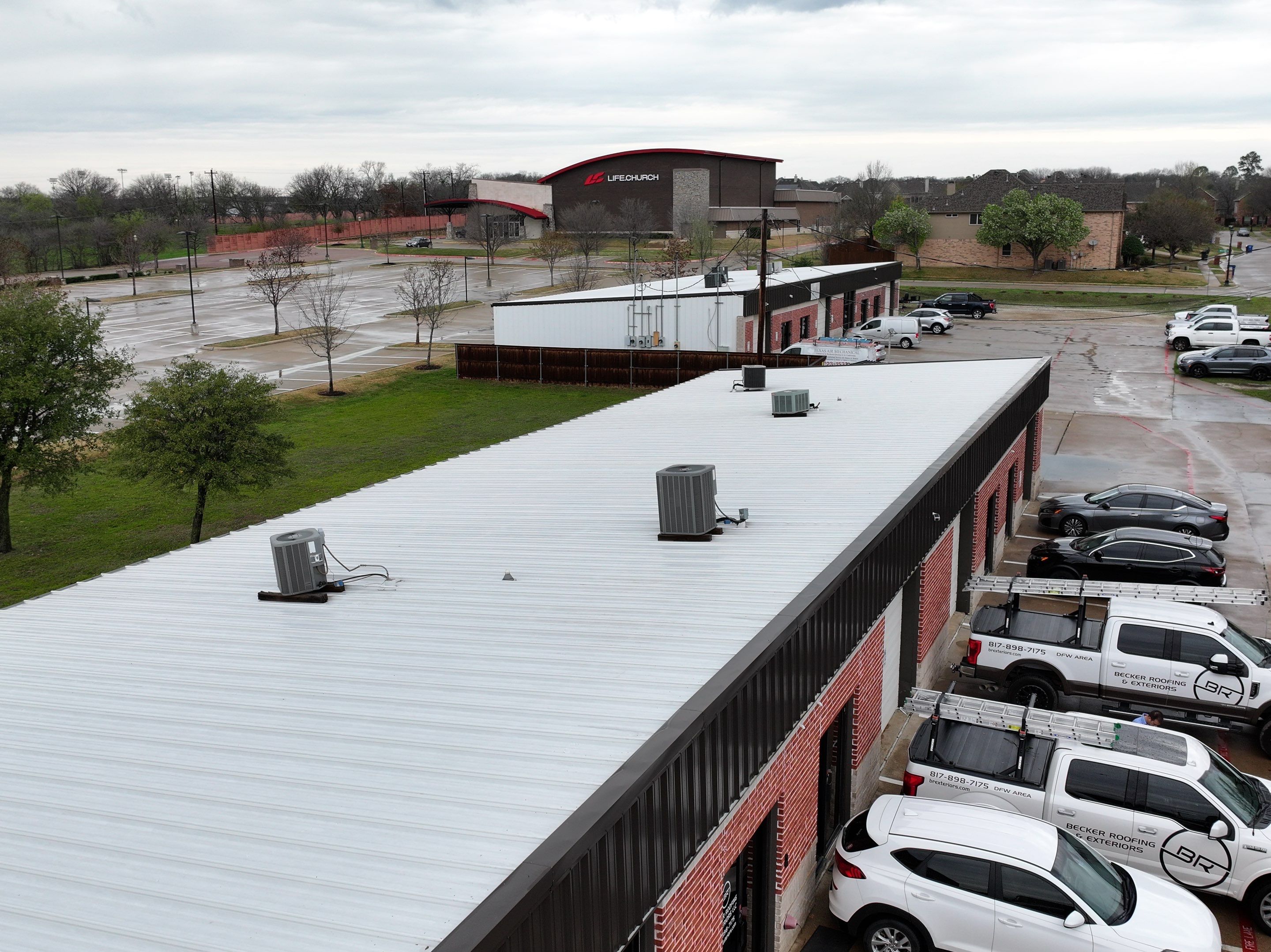 Commercial Roofing Installation using Double lock Mechanical Standing Seam Metal by Becker Roofing and Exteriors