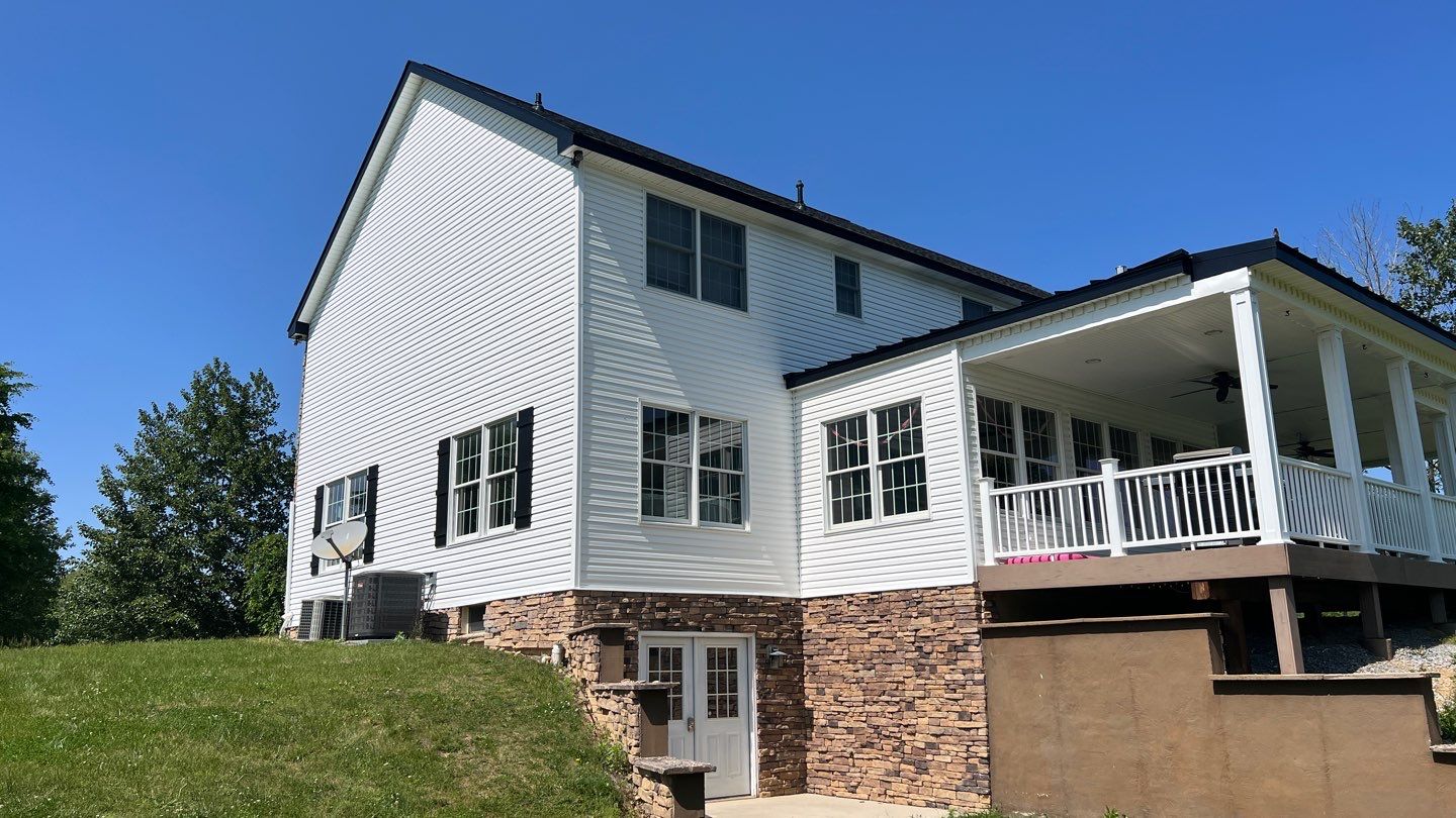 Roof Damage using Certainteed Lifetime Roofing System- Moire Black Landmark Pro shingkes with shadow ridge caps. by BulletpROOF Exteriors