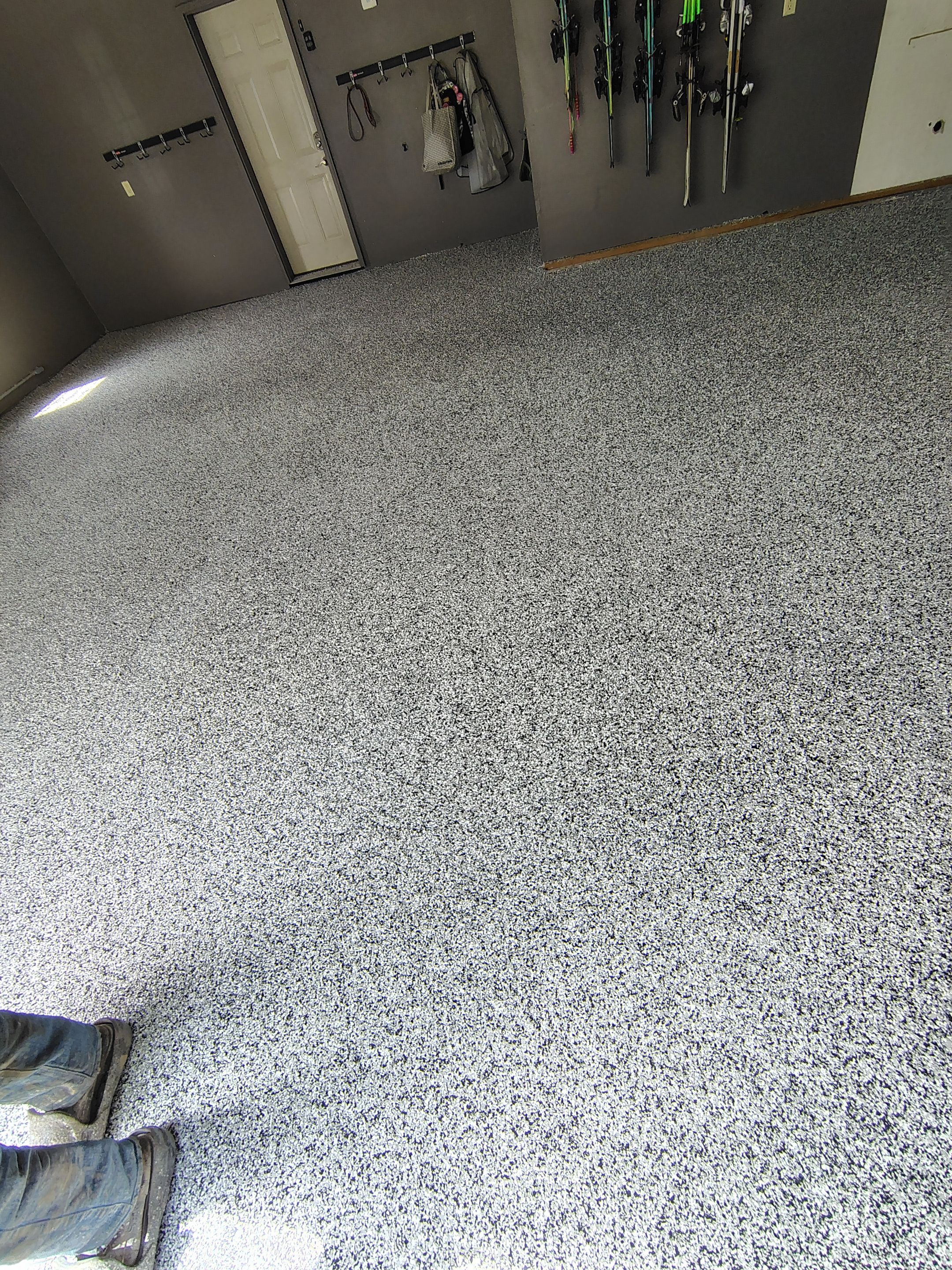 Garage Floor Concrete Coating and Crack Repair in Sioux Falls by Select Painting, Coatings & Garage Cabinets