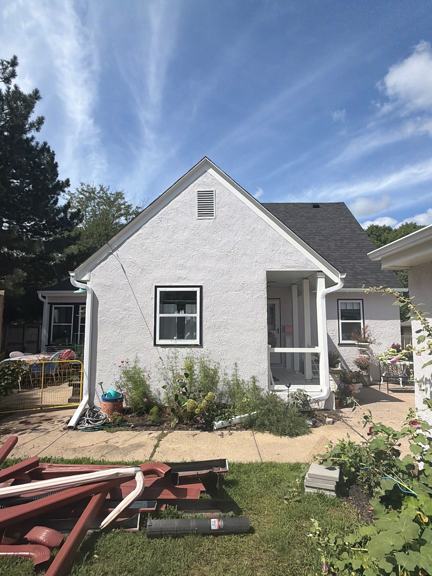 Exterior Stucco Painting and Trim Refresh in Sioux Falls by Select Painting, Coatings & Garage Cabinets
