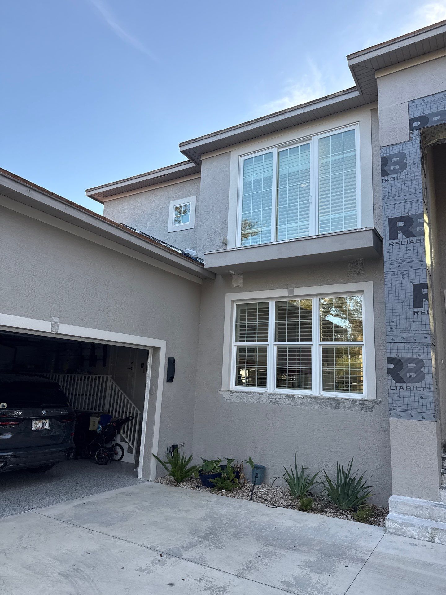 Soffit and Fascia Installation and black seamless gutters in Sarasota FL by Gutter Professors