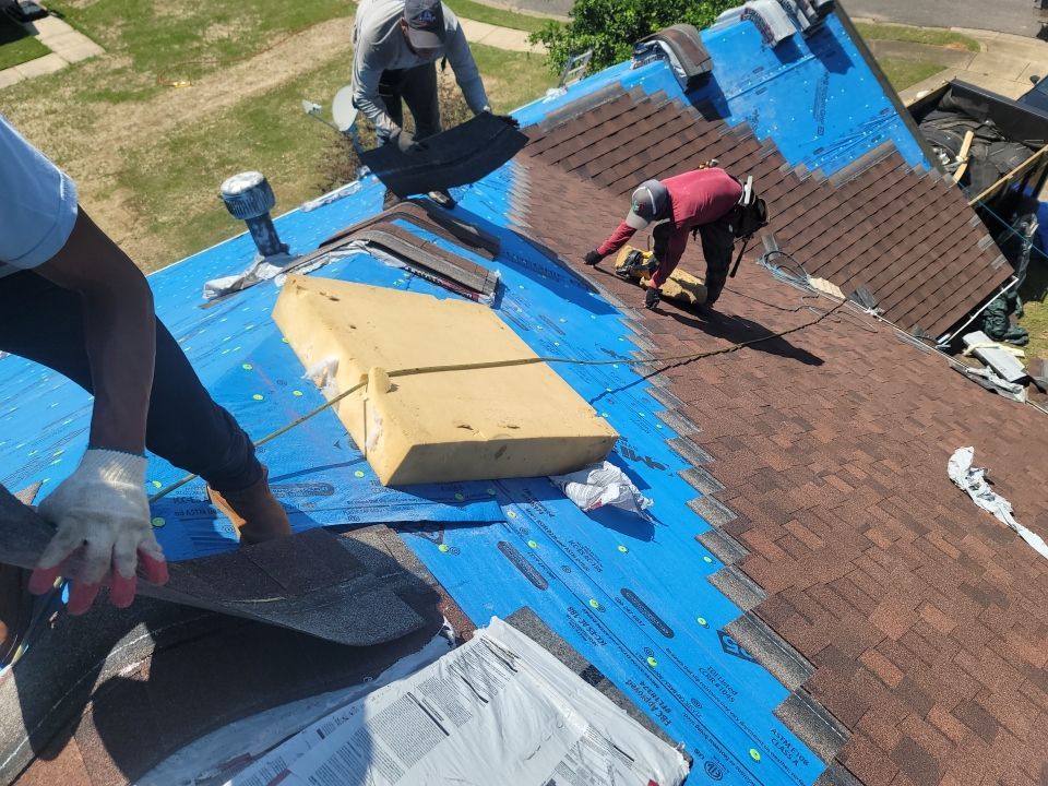 Residential Roofing Installation using Roof Replacement by American Roofing & Construction LLC