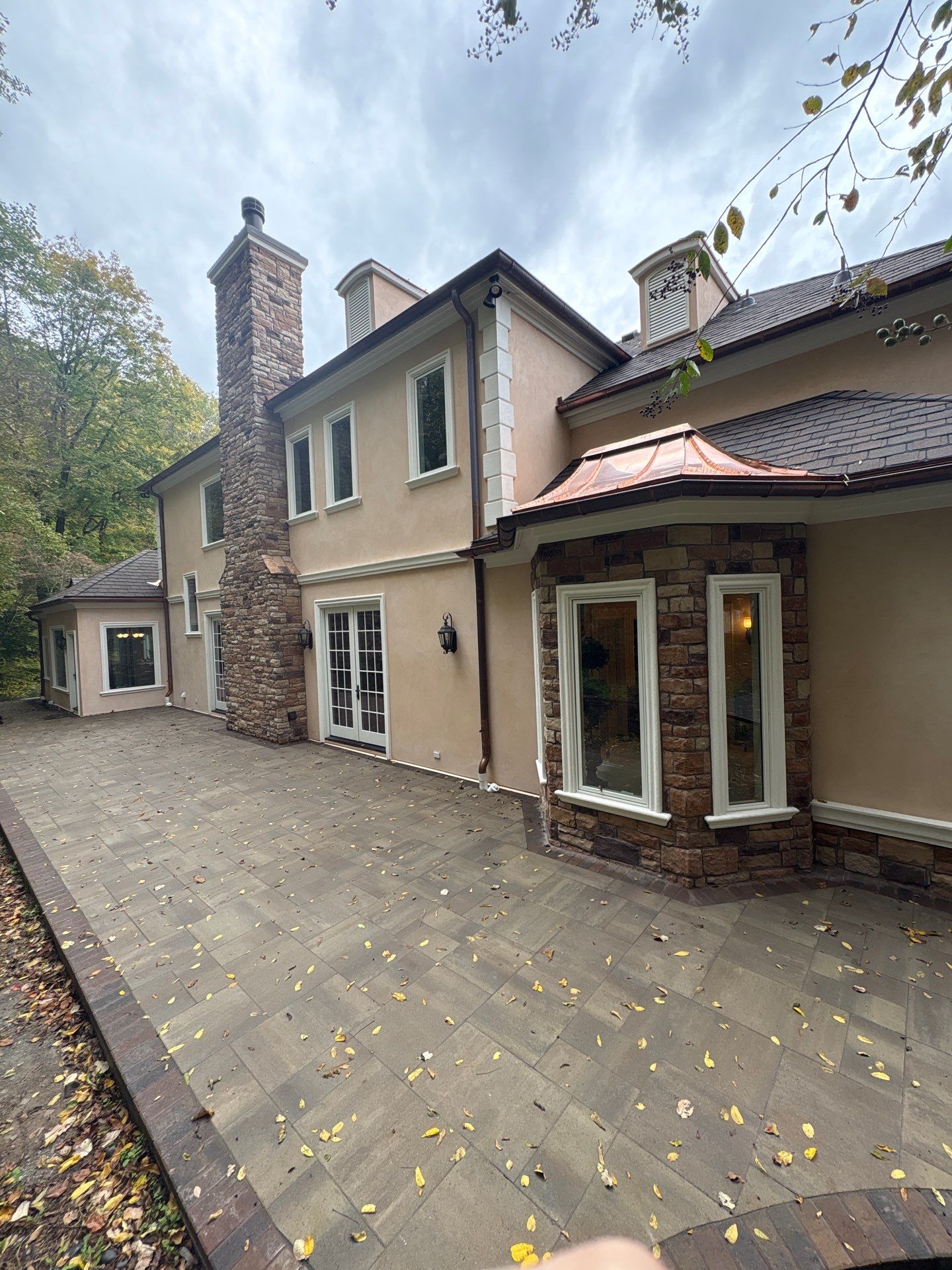 Franklin Exterior Remodel Featuring Custom Stucco and Stone Hardscaping by U.S. Exterior Solutions