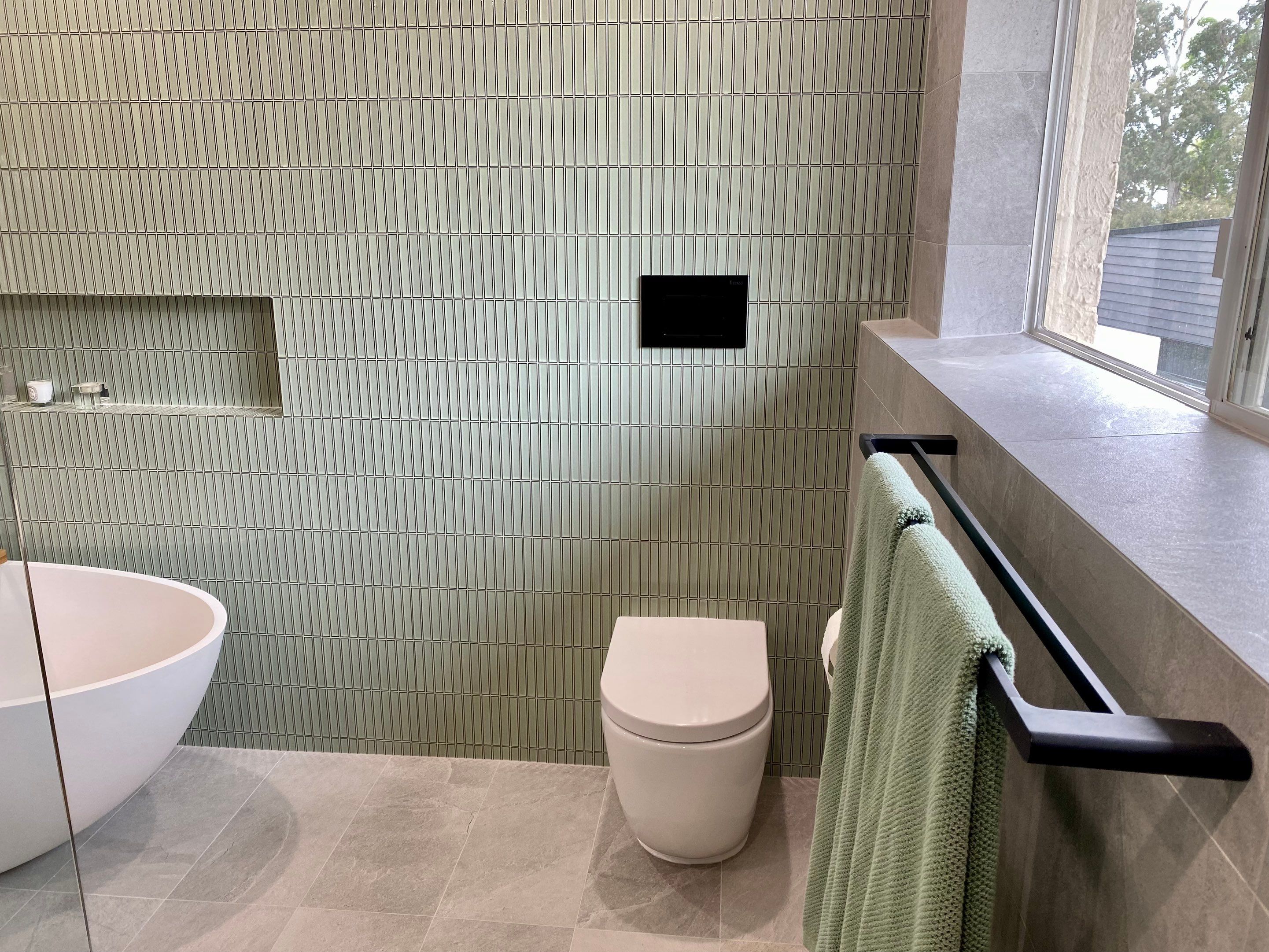 Bathroom Renovation using XROCK 36W White natural 300 x 600 by Re-seal Bathrooms