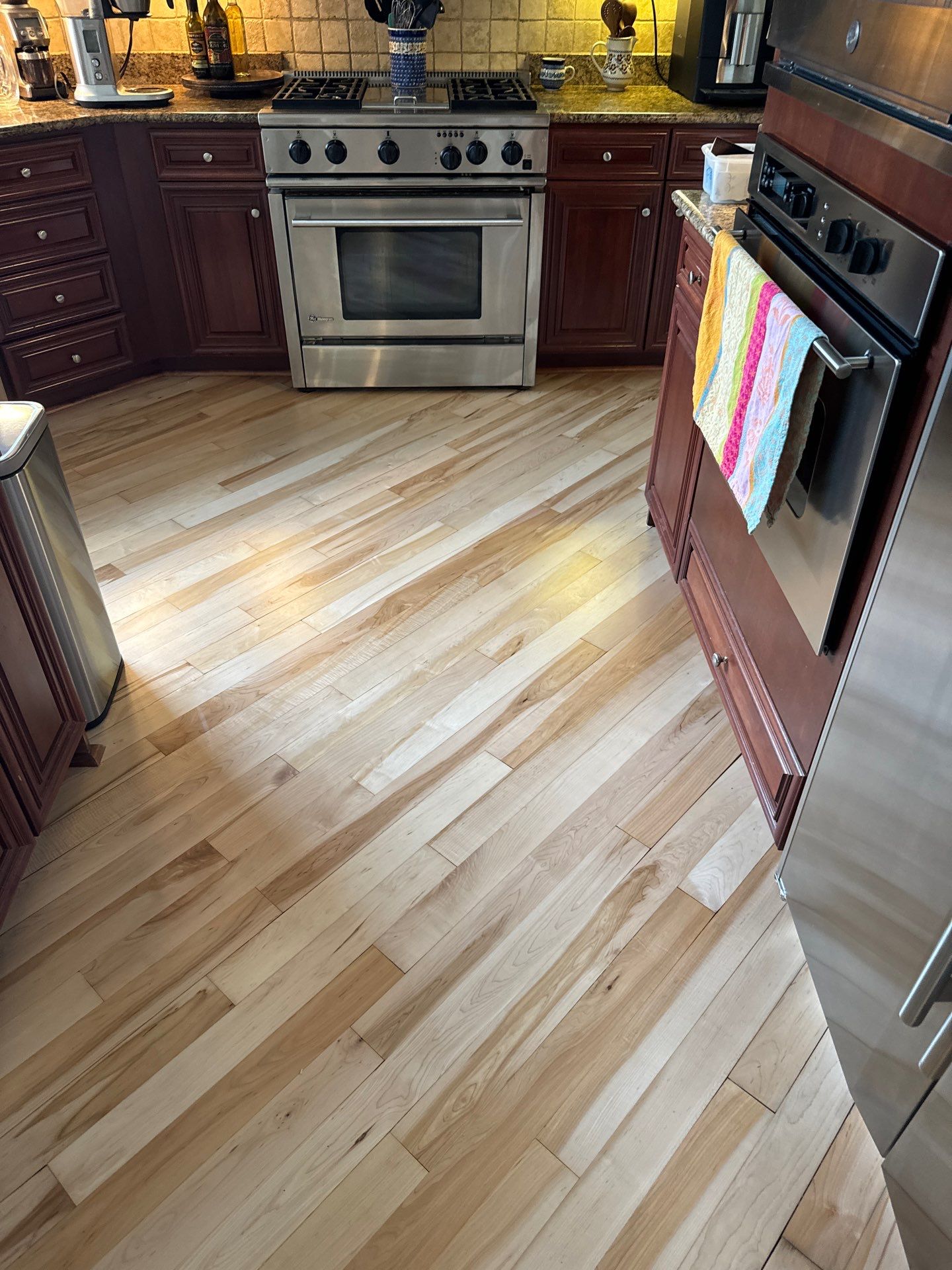 Prefinished Maple transformation by Ann Arbor Hardwoods 