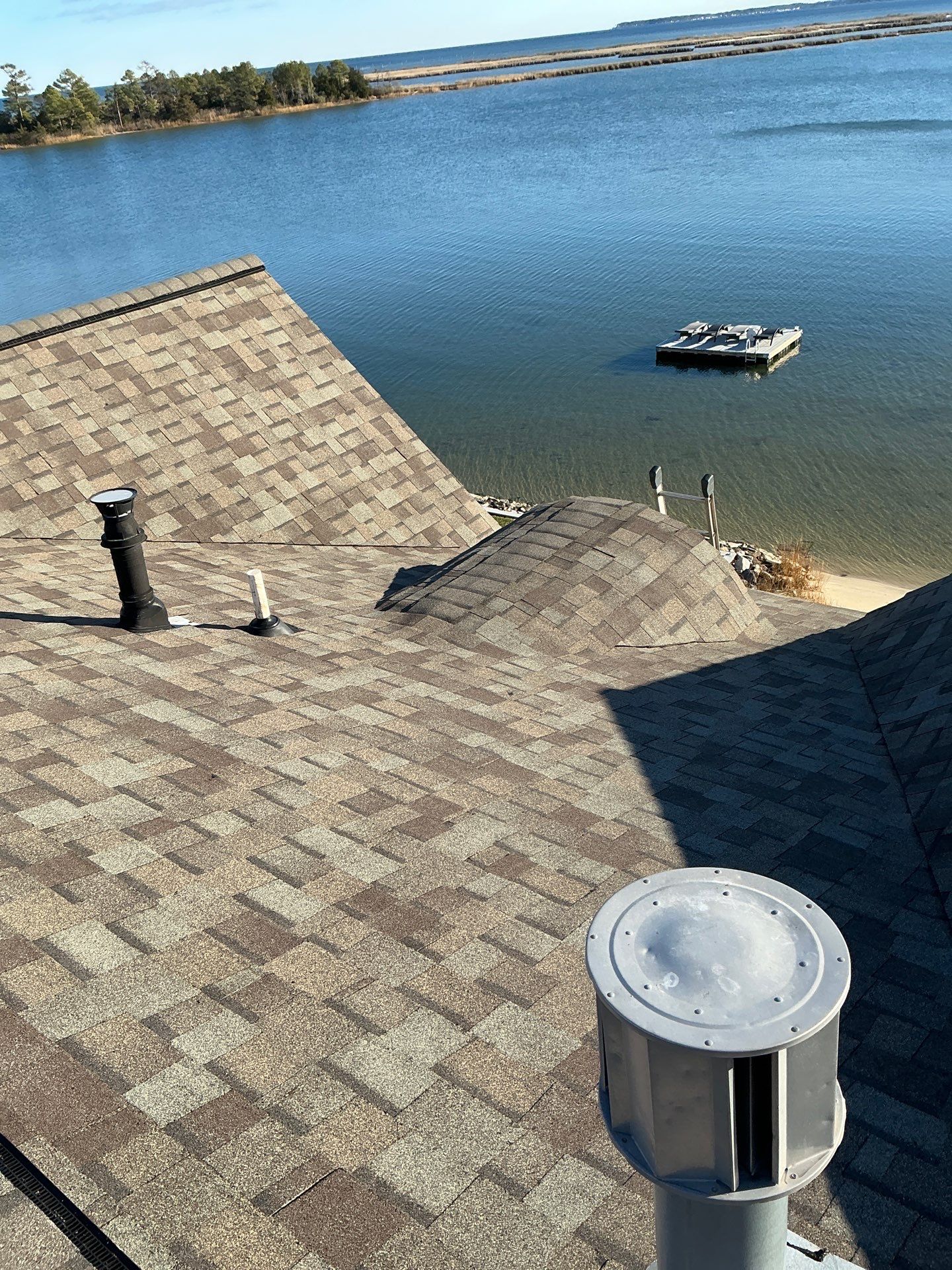 Waterfront Roof Replacement in White Stone, VA by Cade Construction