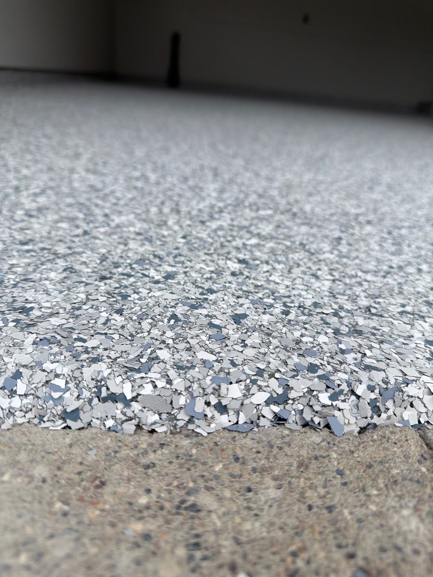 Muskegon Garage Interior Painting and Epoxy Flake Floor Installation by Gordon Painting