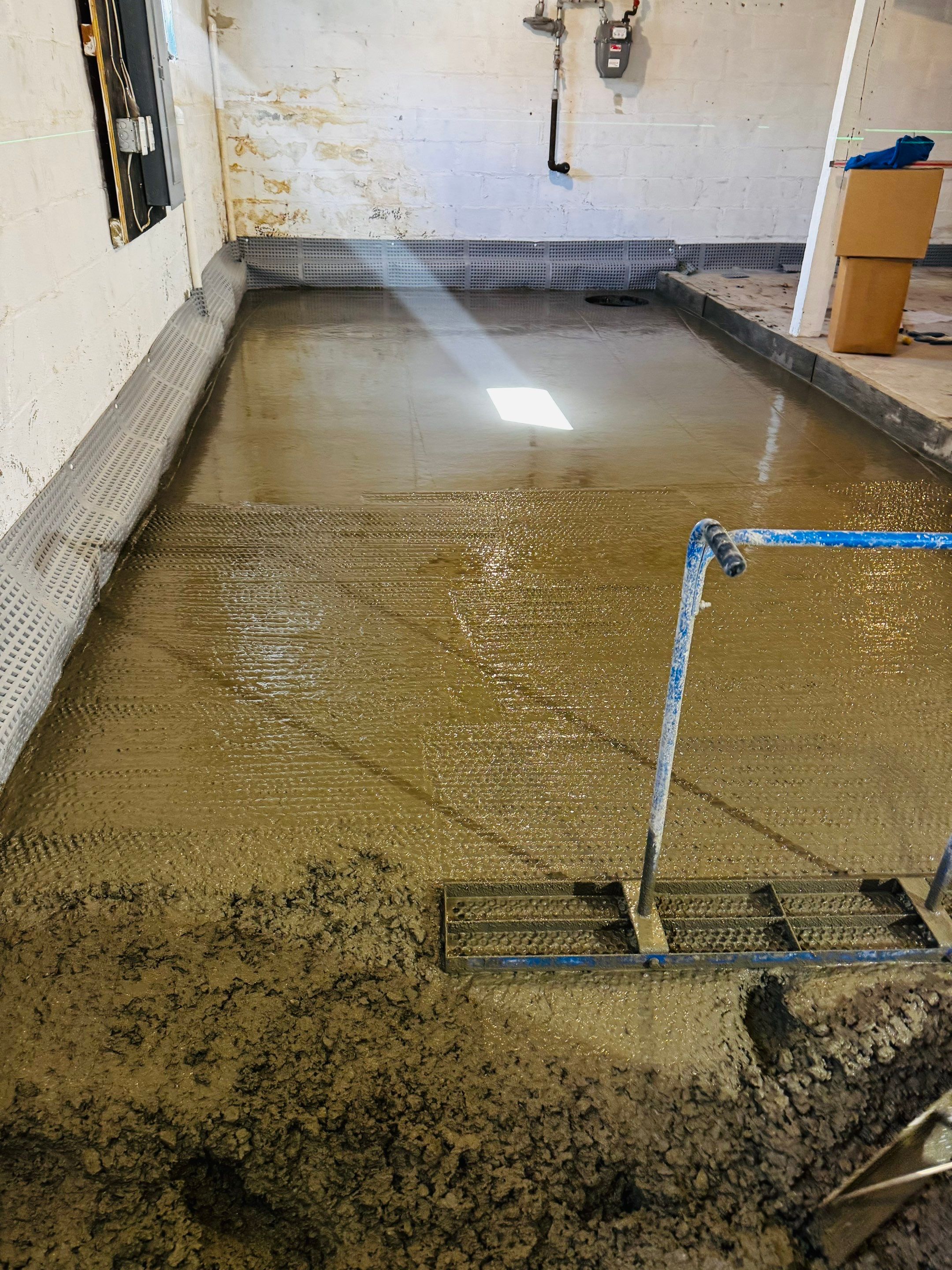 Concrete Floor Replacement and Interior French Drain Project in Morris Plains, New Jersey by Pure Service Pro, LLC 