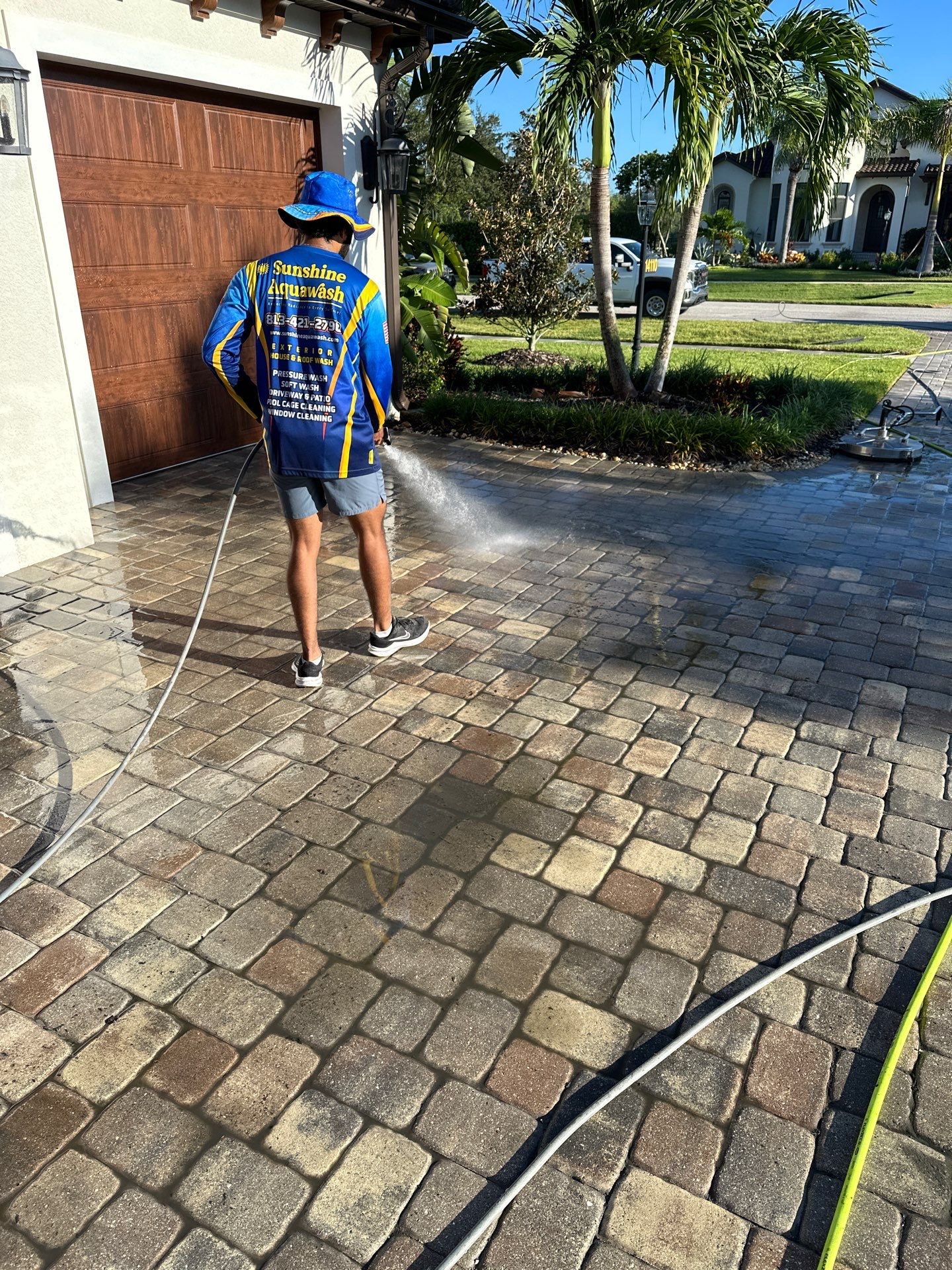 Paver Driveway, Sidewalk, and Pool Deck Cleaning in Winding River Community, Bradenton, FL by Sunshine AquaWash