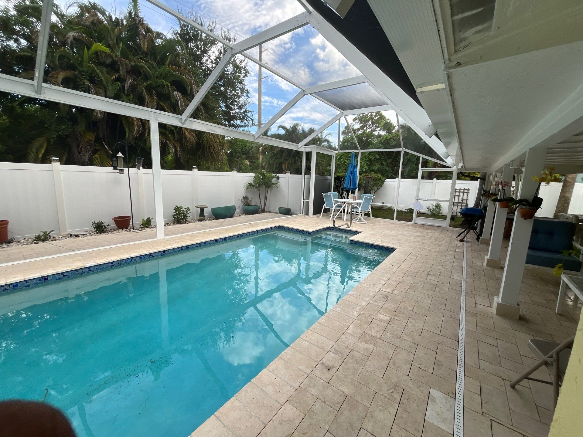 Custom White Pool Enclosure Installation by The Screen Depot, Inc