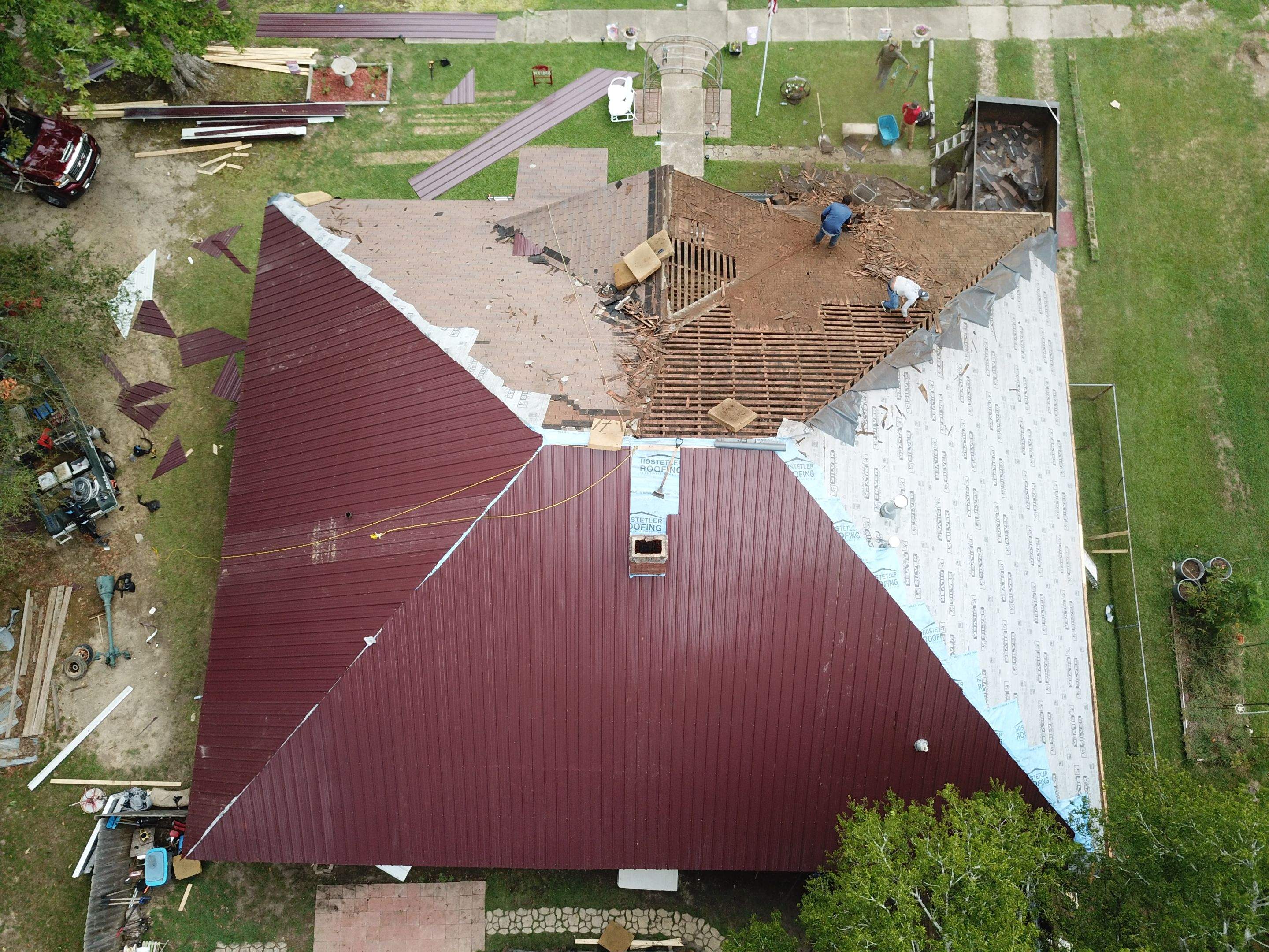 Residential Metal Roof Replacement using Reed's Metals: Colored Residental Panel (Burgundy) by Hostetler Roofing