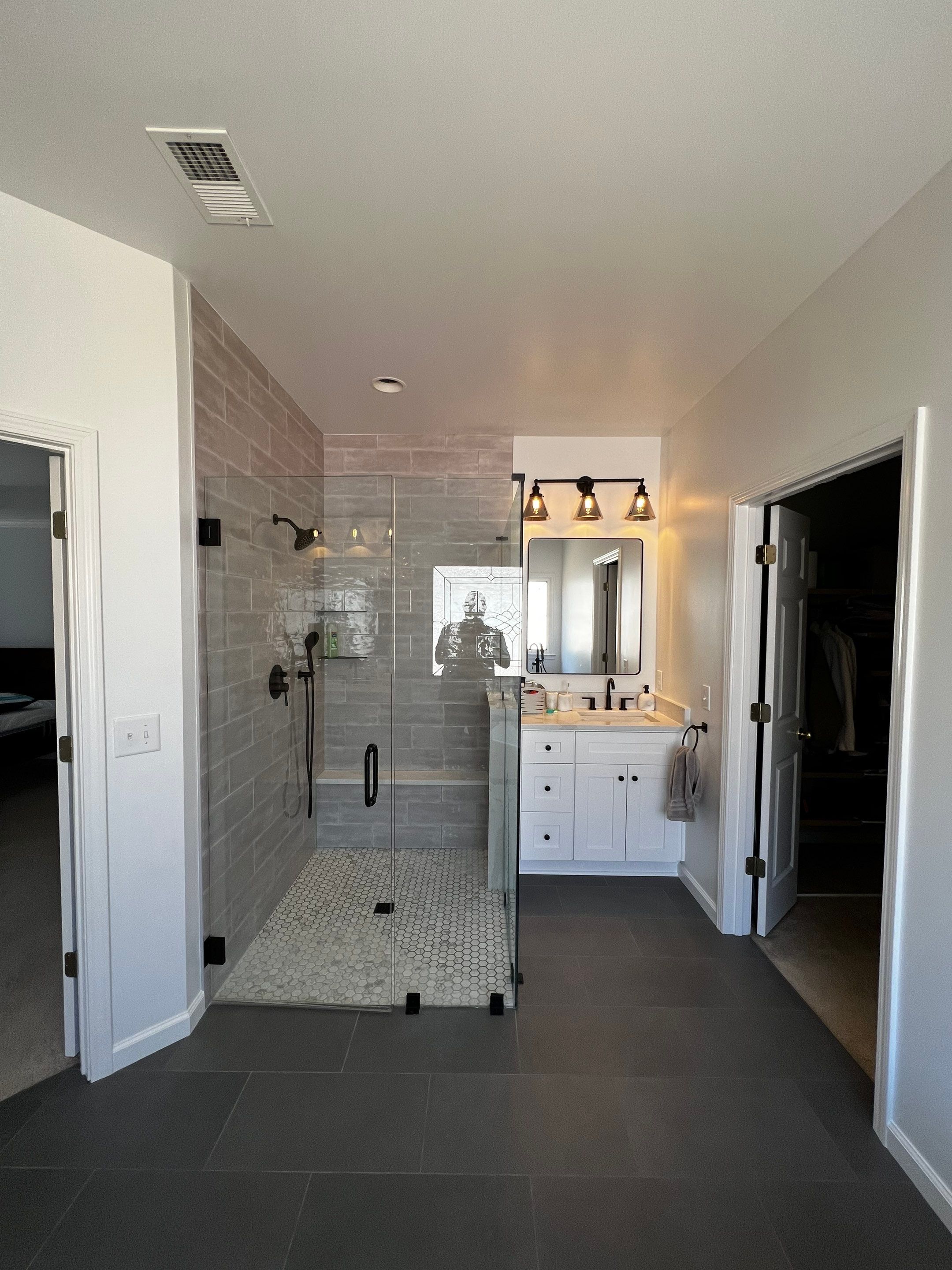 Modern Master Bathroom Remodel and Bedroom Painting in Woodstock by Swift Home Renovations