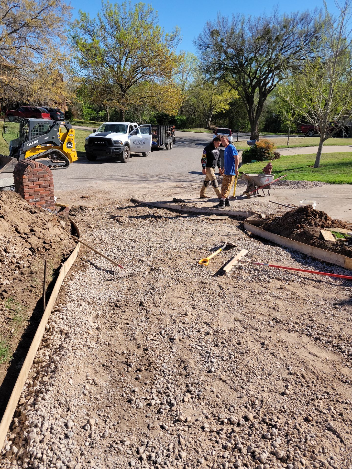 Concrete Driveway and Fence by Clays Services Inc