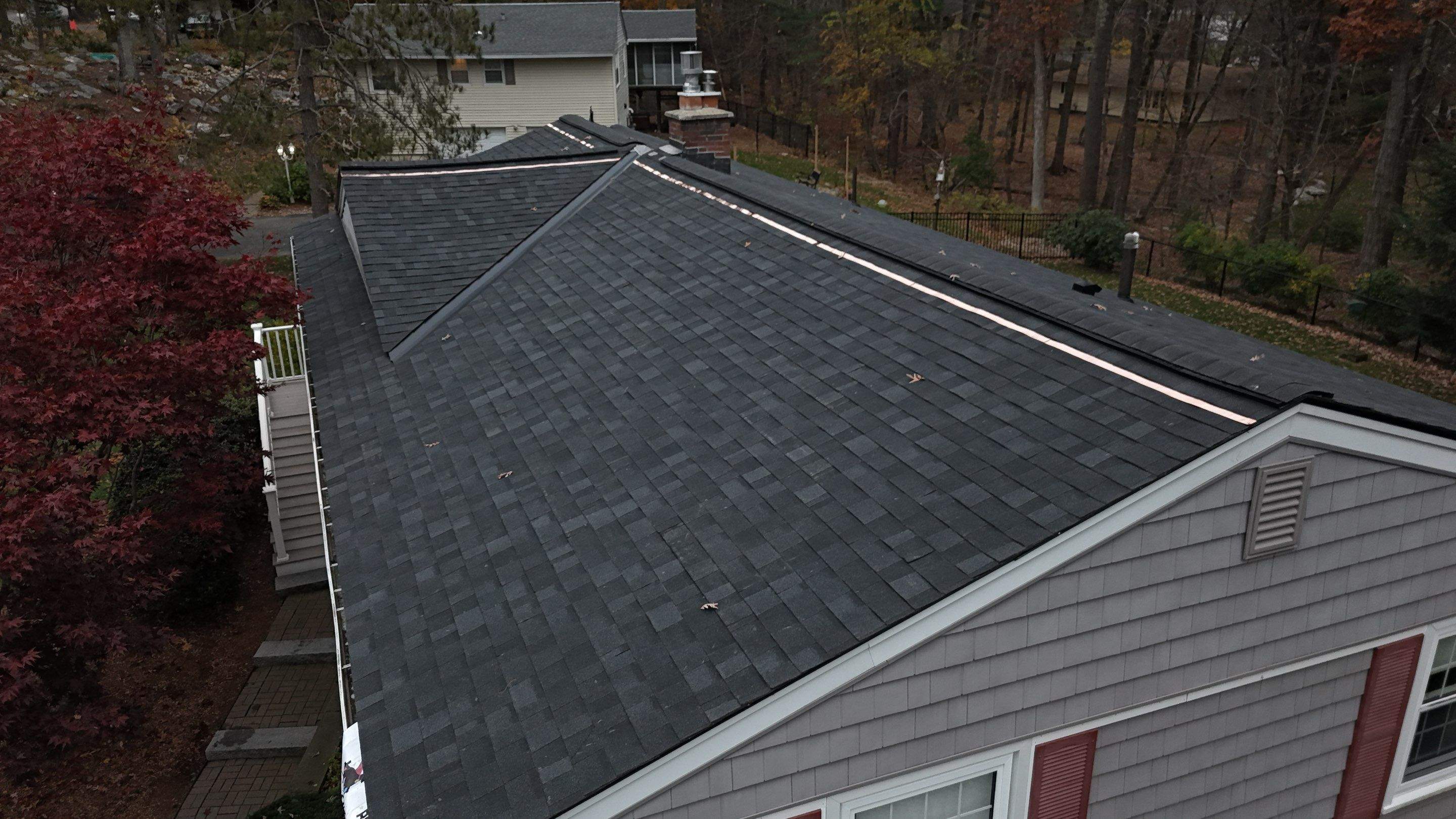 Chelmsford Complete Roof Replacement in Onyx Black with Balanced Ventilation by Mighty Dog Roofing of Greater Middlesex County