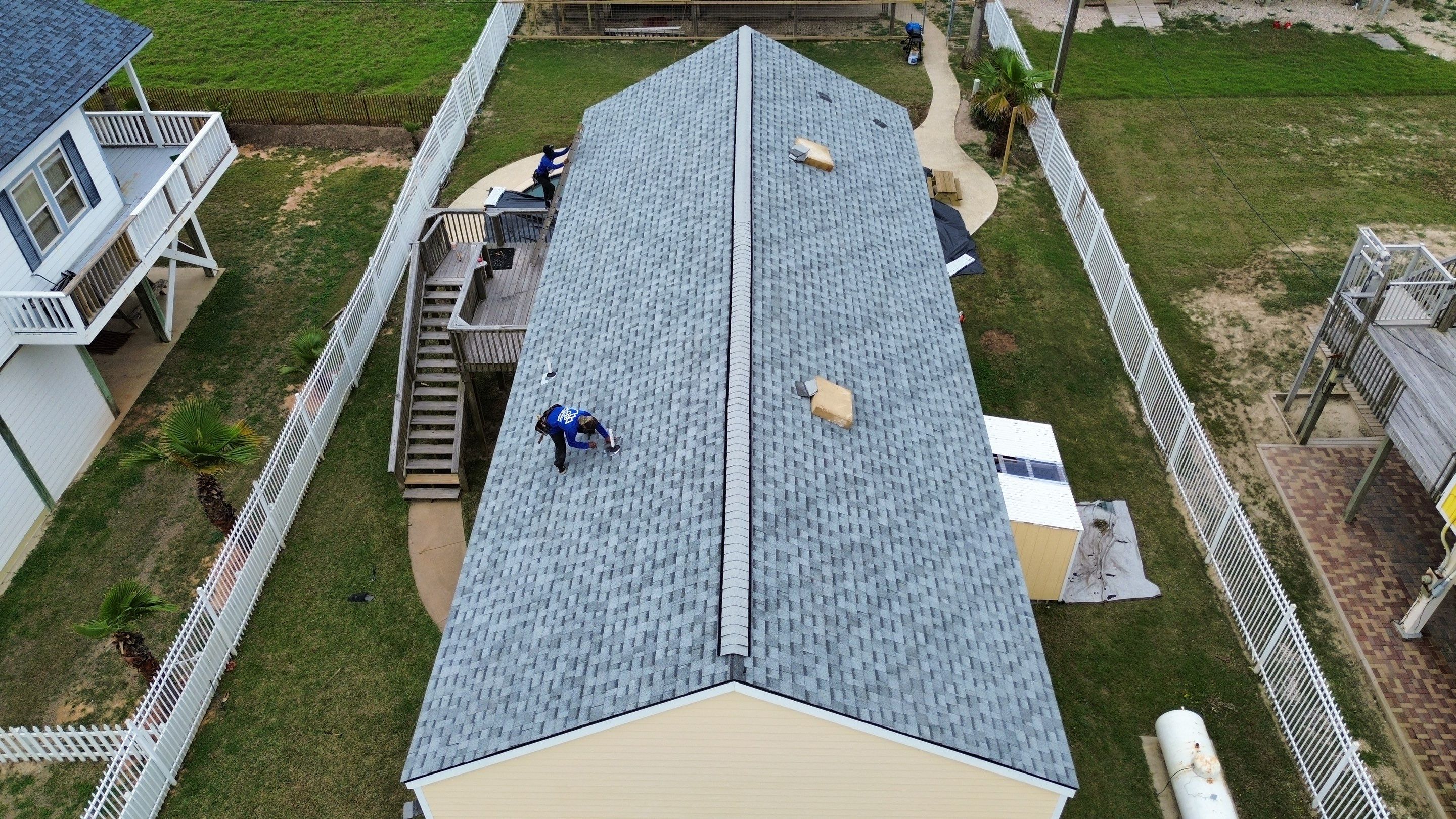 Roof Replacement using IKO Cambridge Dual Grey by CAP Roofing and Construction LLC