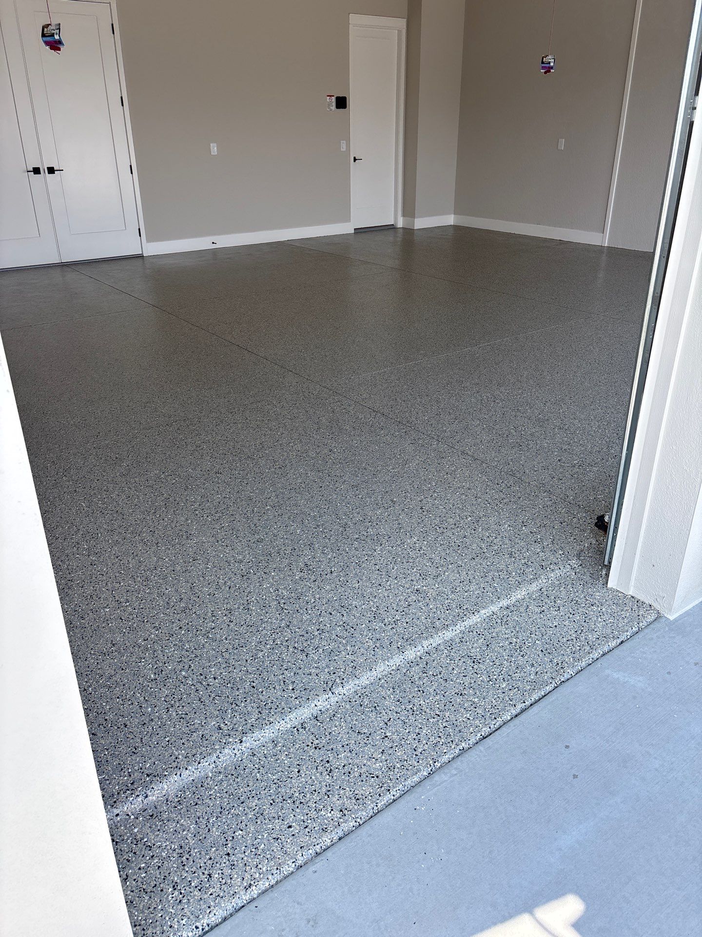 Garage Mediterranean  by Innovative Concrete Coatings 