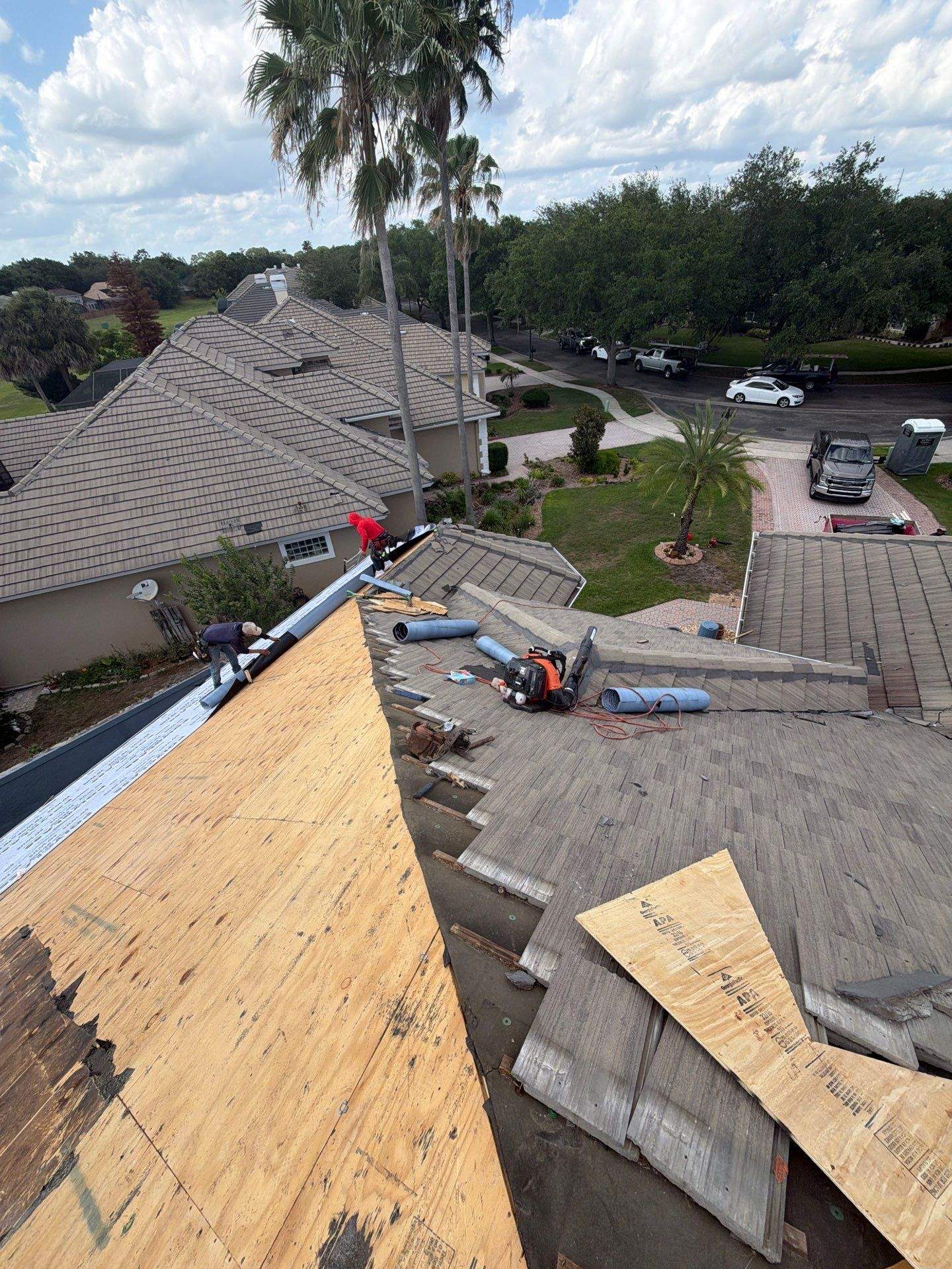 Winter Park Concrete Tile Roof Replacement and Chimney Flashing Installation by Fortified Roofing Solutions Corp.