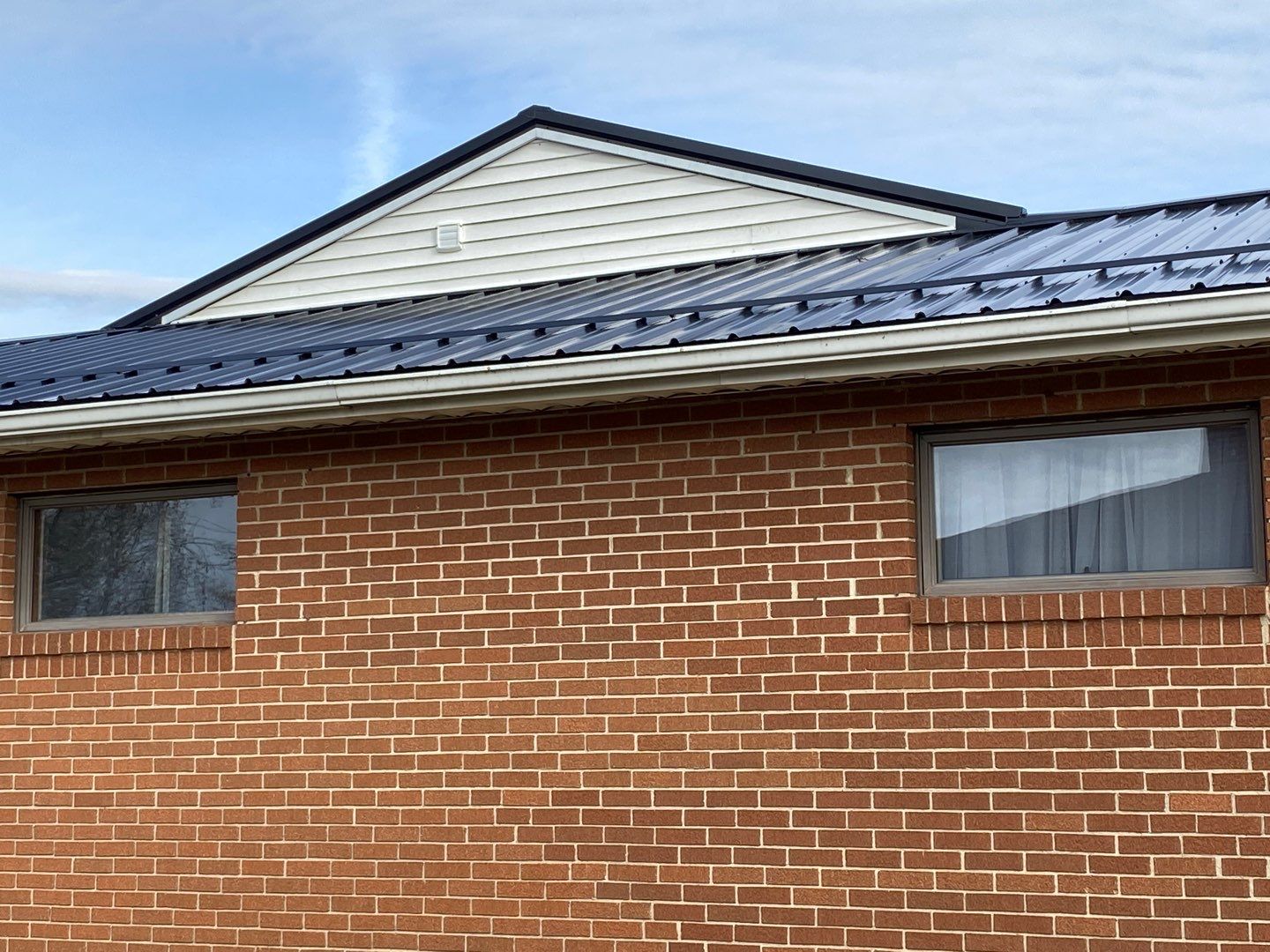 Residential Roofing Installation using Perfromance Panel Metal - Black by RoofX 