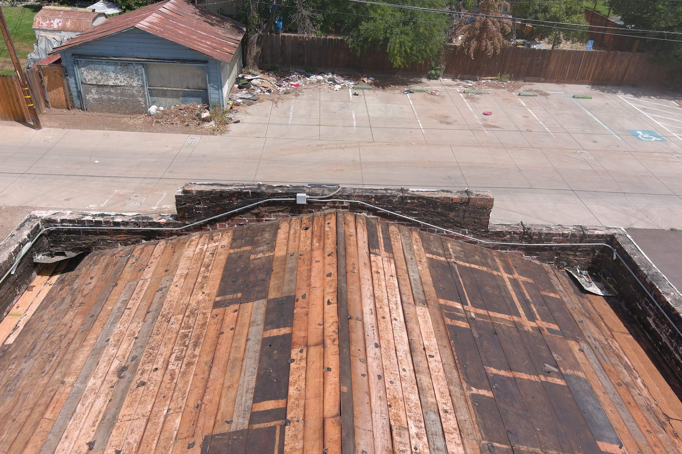 Commercial Roofing Installation using Conklin BenchPly system with PUMA top coat (imbedded fabric system) by Straight Edge Roofing Inc
