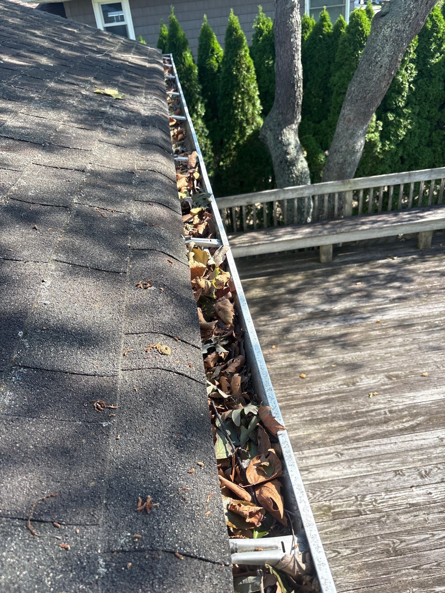 Gutter Cleaning & Debris Removal in Bellmore, NY by Above All Gutters