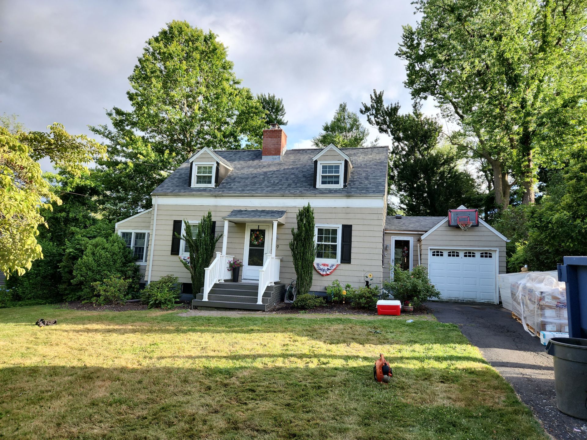 Complete Exterior Estate gray with Pacific Blue Siding by A Plus Exterior