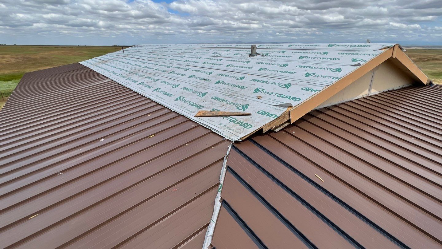 Metal roofing installation using Standing seam metal roofing system by Straight Edge Roofing Inc
