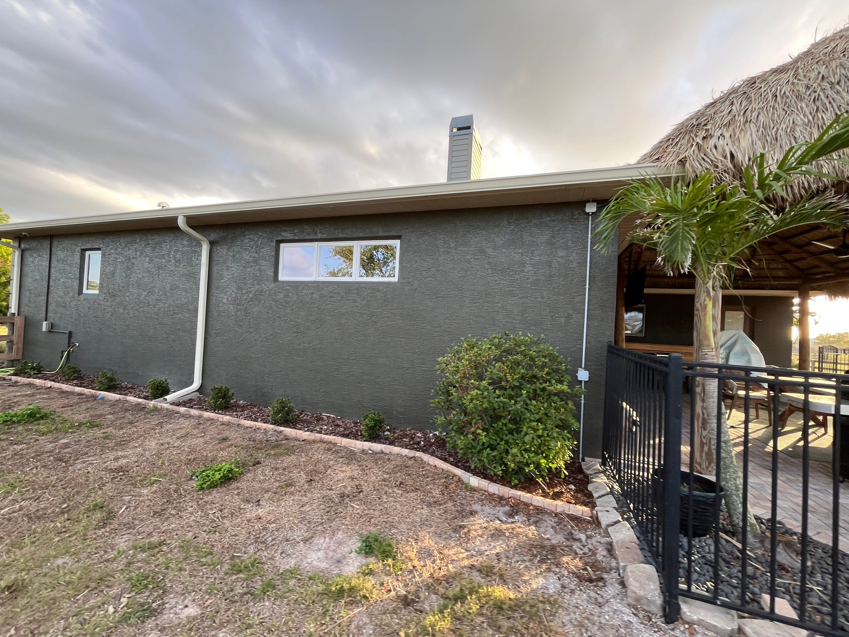  7-inch White seamless gutters and downspouts in Myakka City FL by Gutter Professors