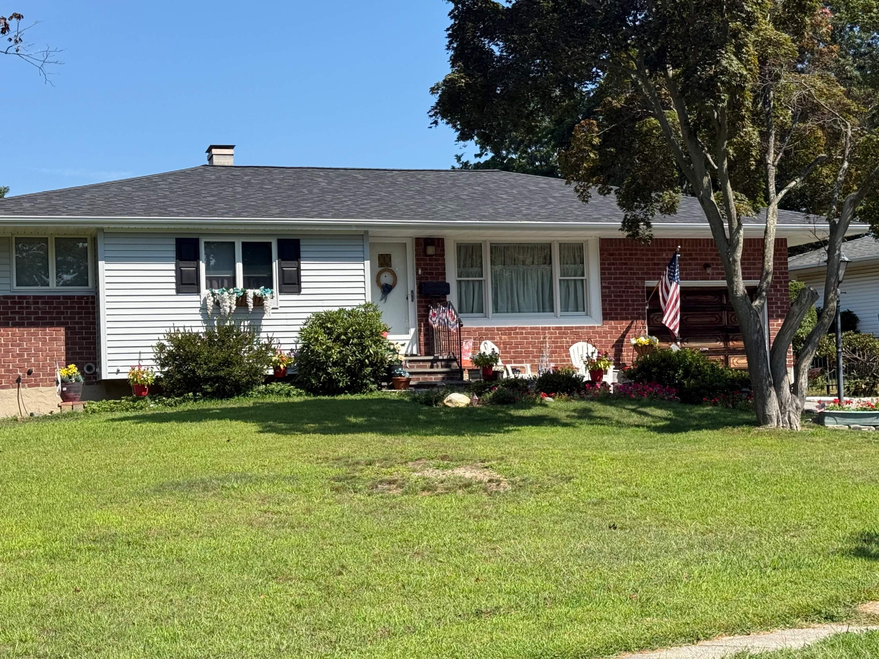 Roofing and siding replacement in Commack by Smart Choice Contracting