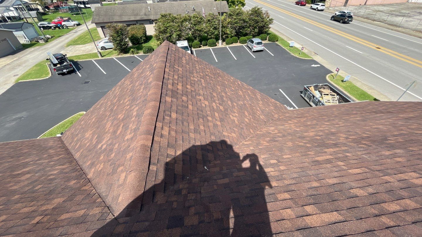 Commercial Roofing Installation using Performance Shingles by Mr. Roofer
