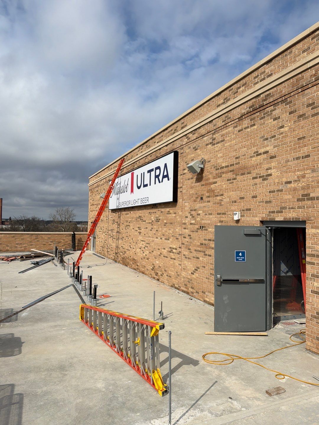 South Bend Stadium Event Building and Premium Suite Signage Installation by Hayes Design co