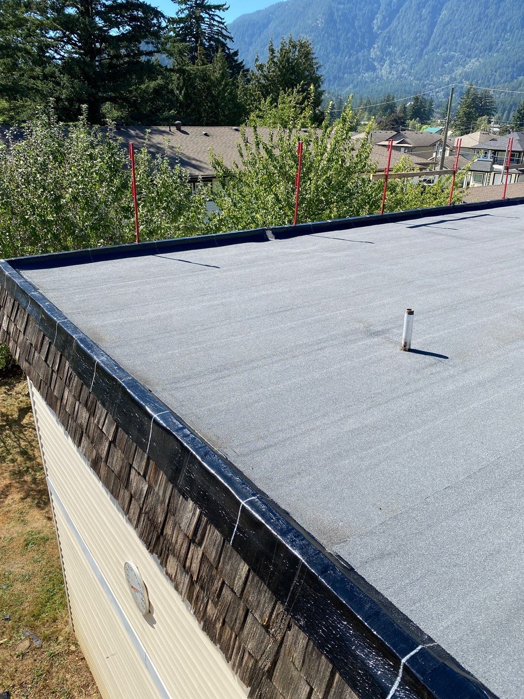 Residential ReRoofing Installation using IKO 2ply sbs  by Top Notch Roofing Inc