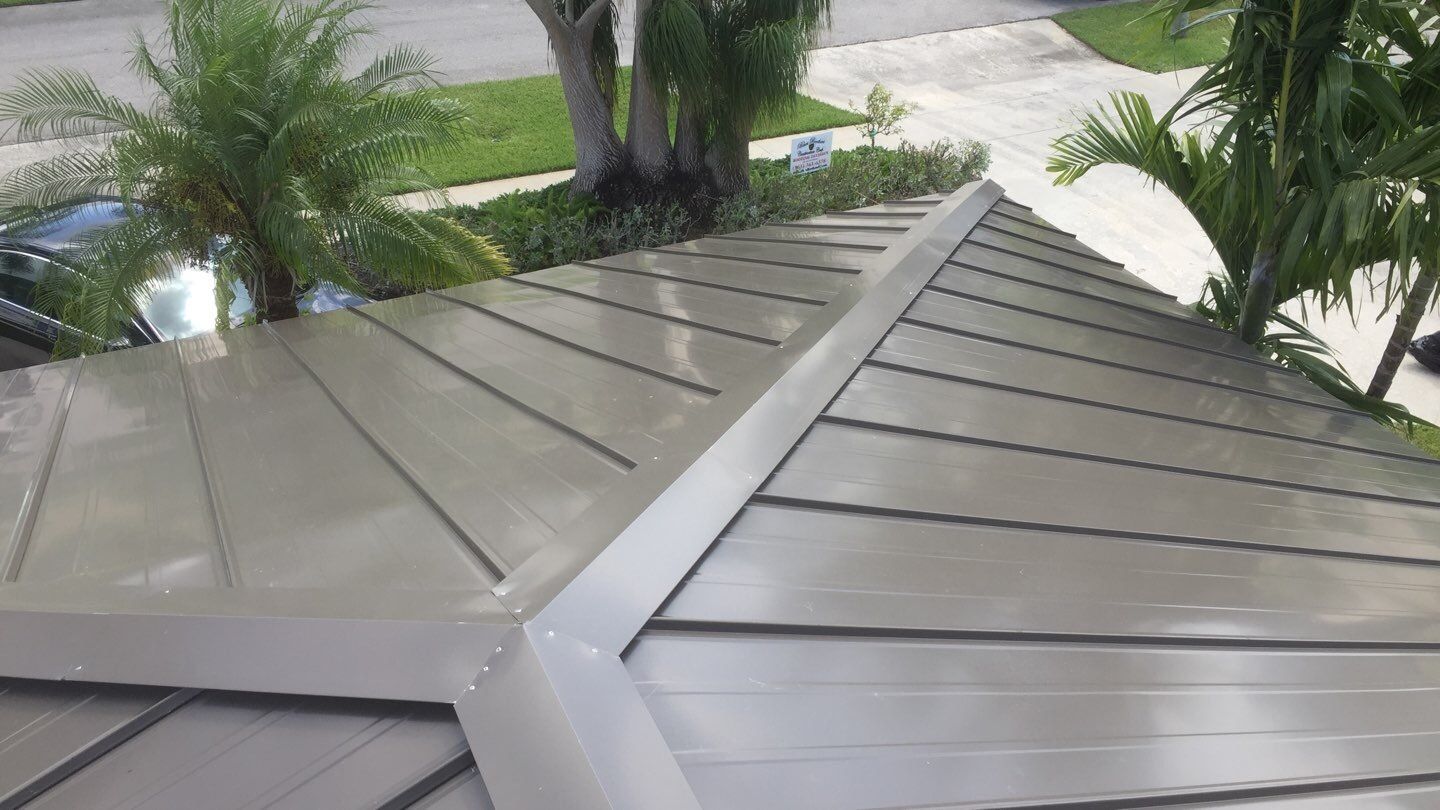 Residential Roofing Installation using 1" Nail strip metal roof by BLUES BROTHERS CONSTRUCTION CORP