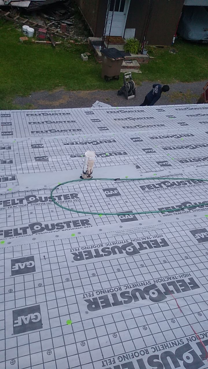 Residential Roofing Installation using Roof Replacement by American Roofing & Construction LLC