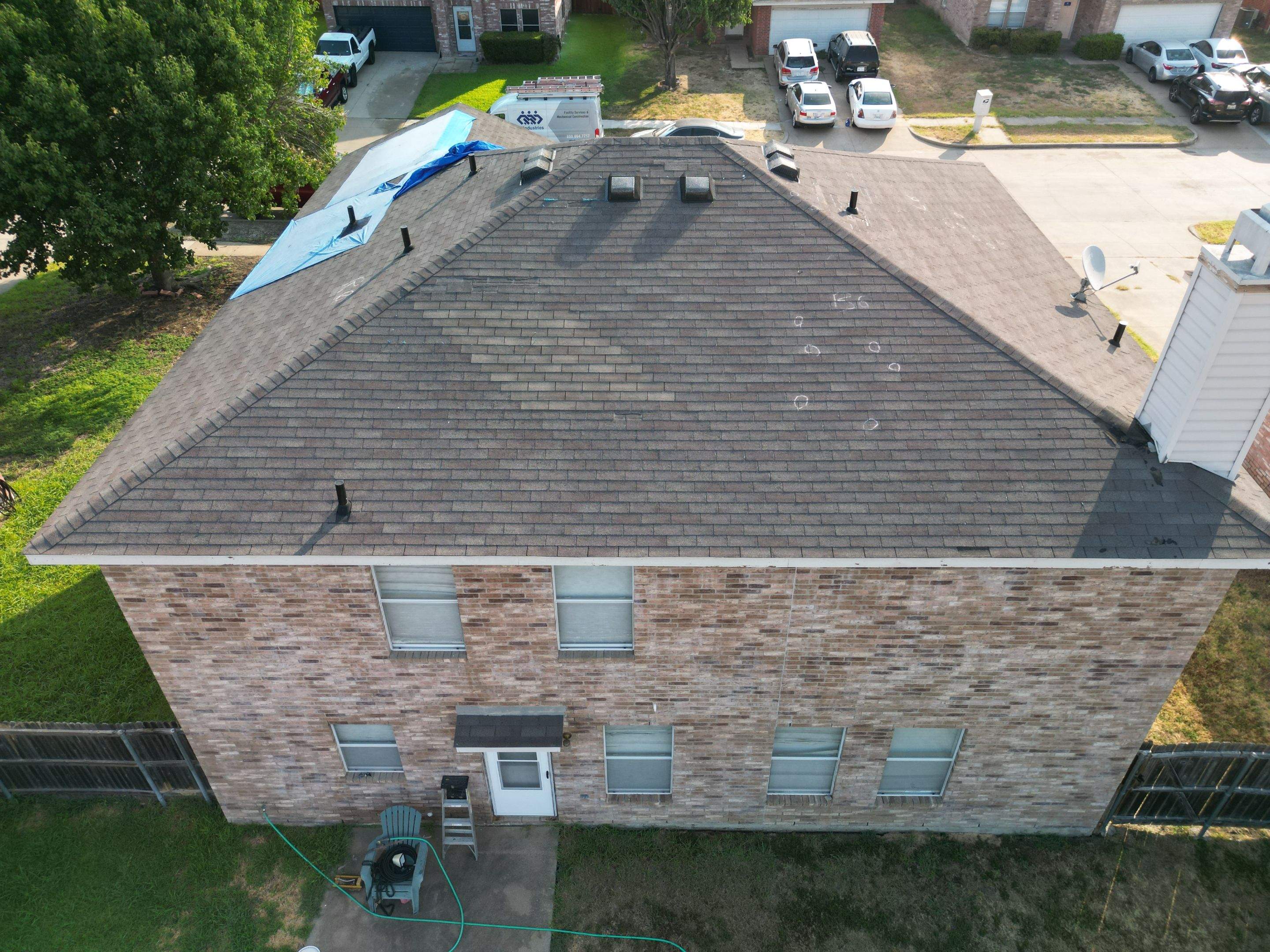 Full Roof Replacement, Chimney Rebuild and Interior Damage Replacement by First United Roofing & Construction