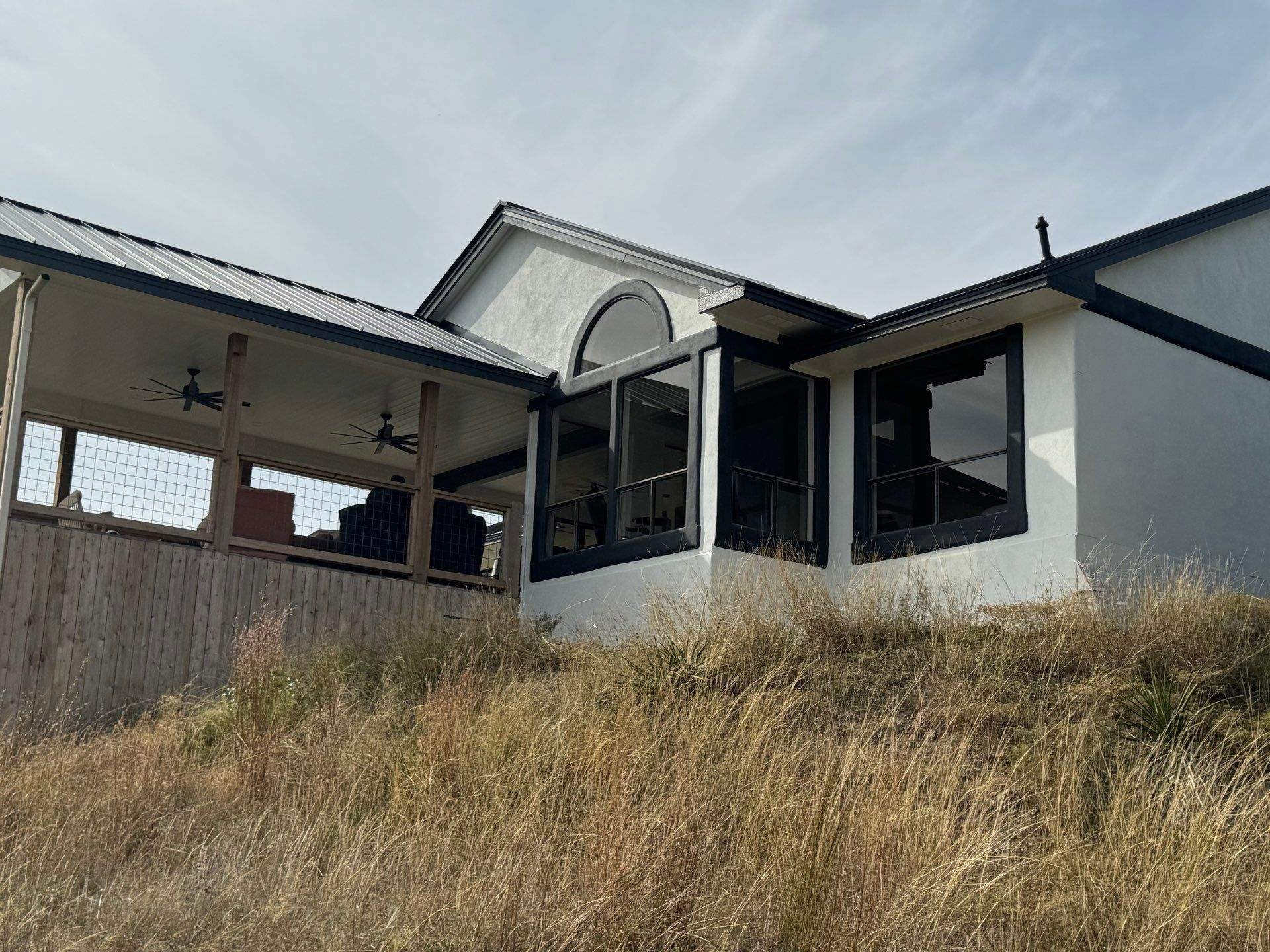 Residential Roofing Installation using Standing Seam Metal (Color, 500 Kynar Finish) in Matte Black by Texas Choice Roofing