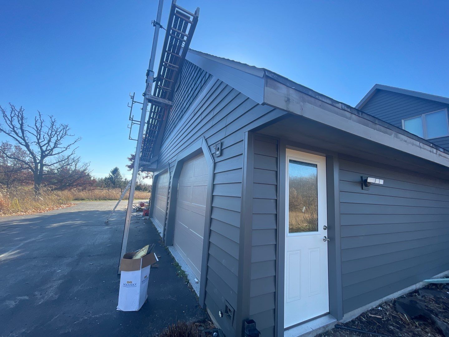 Siding Installation using Norandex Polar Wall Plus Siding, Window Wraps by Total Exteriors